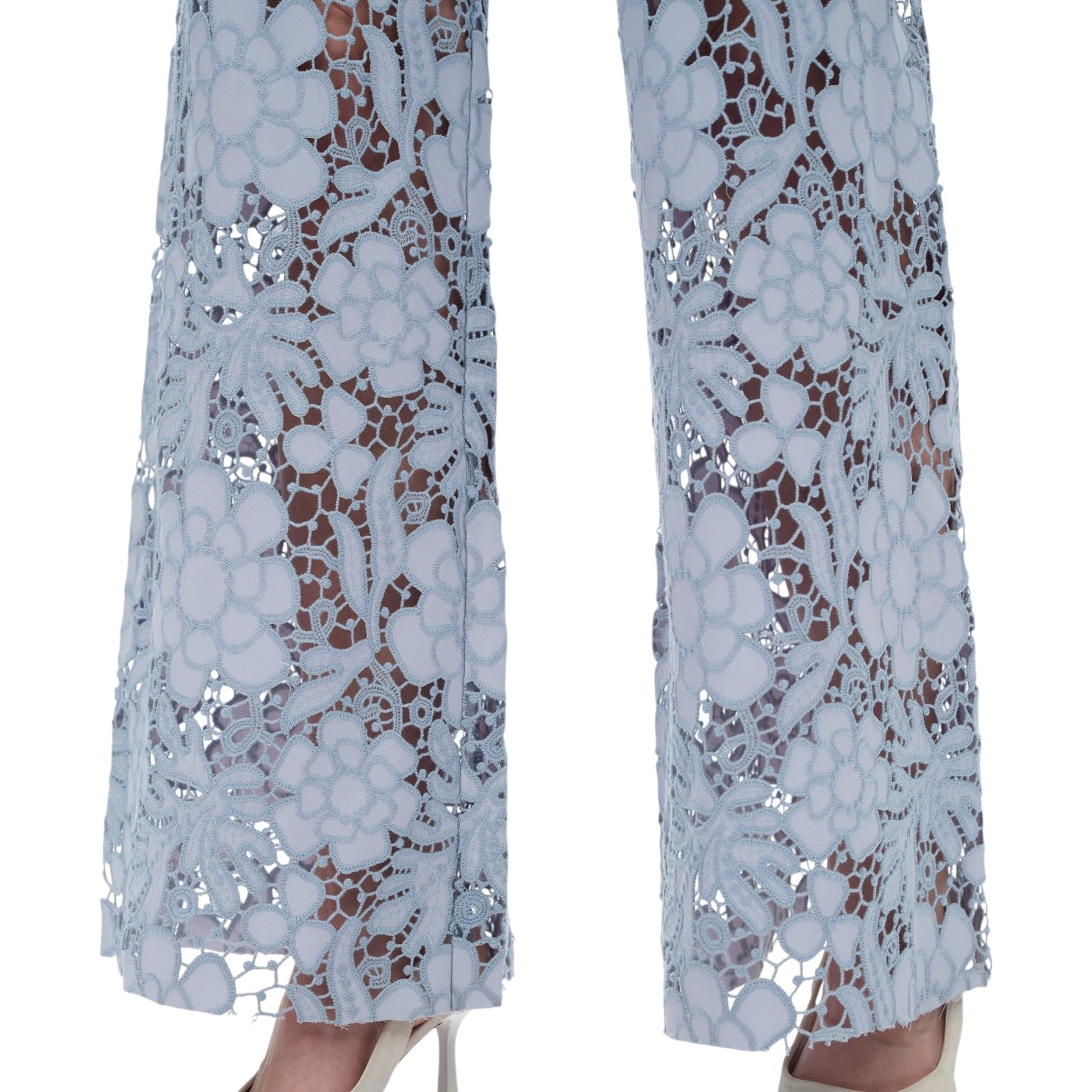 Light blue lace pants on a white background