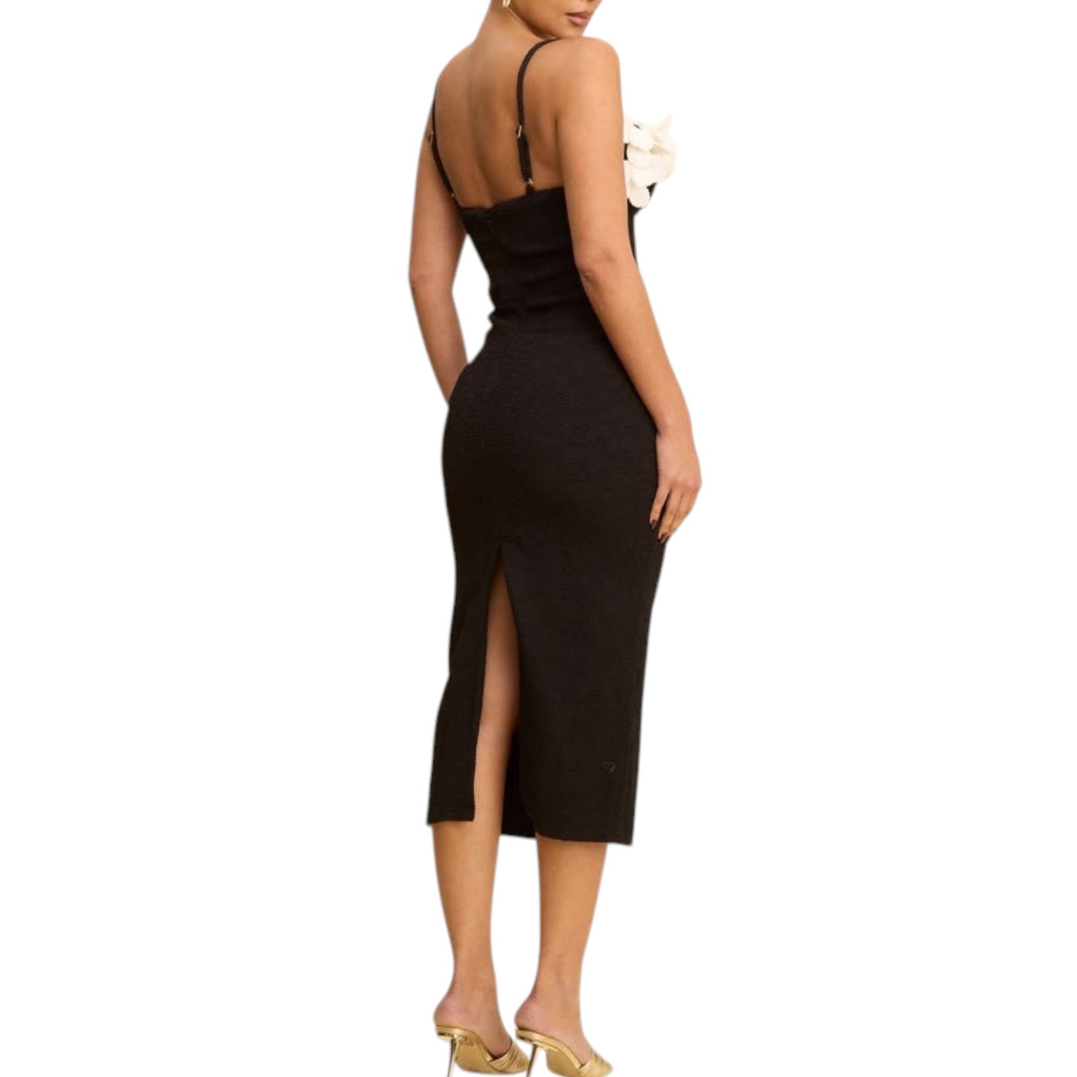 Black dress with a backless design and a slit on a white background