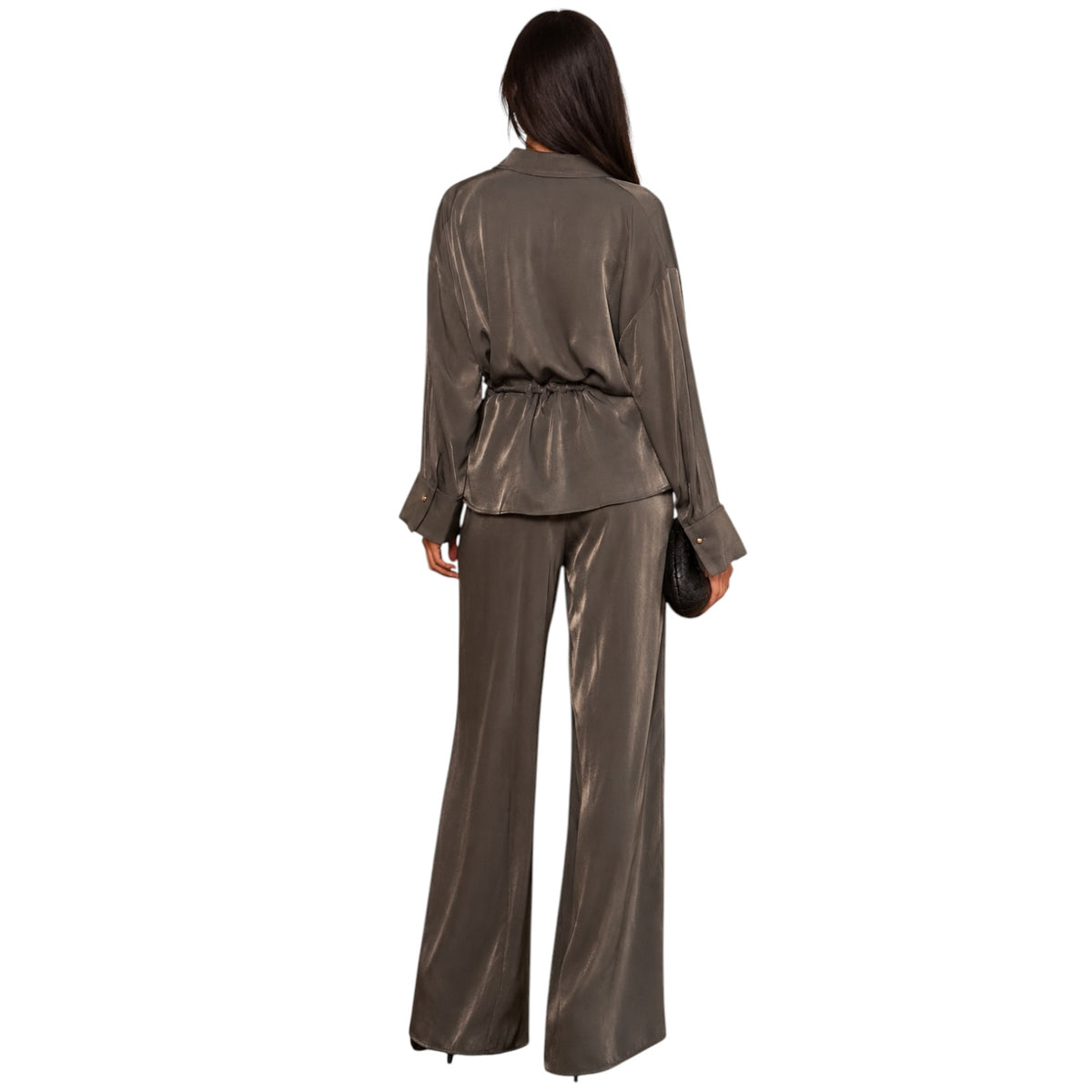 A woman shown from the back wearing a matching metallic taupe-brown two-piece set consisting of a long-sleeve belted jacket and wide-leg trousers, against a plain white background.