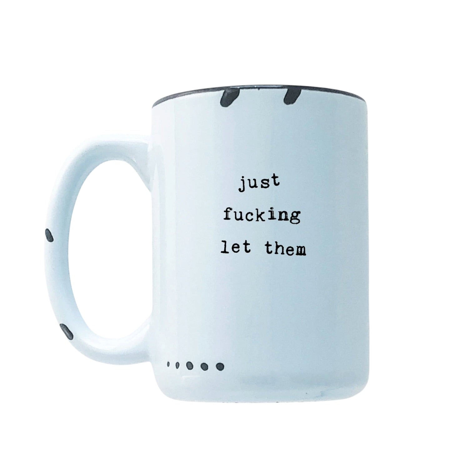 A blue ceramic mug with black printed text reading 'just fucking let them' on the front, shown against a plain white background.