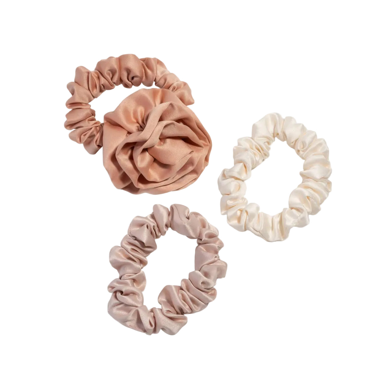 Set of four scrunchies in pink and beige on a light gray background