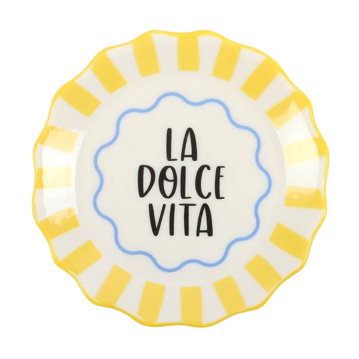 Ceramic plate with 'La Dolce Vita' text and yellow stripes on a white background