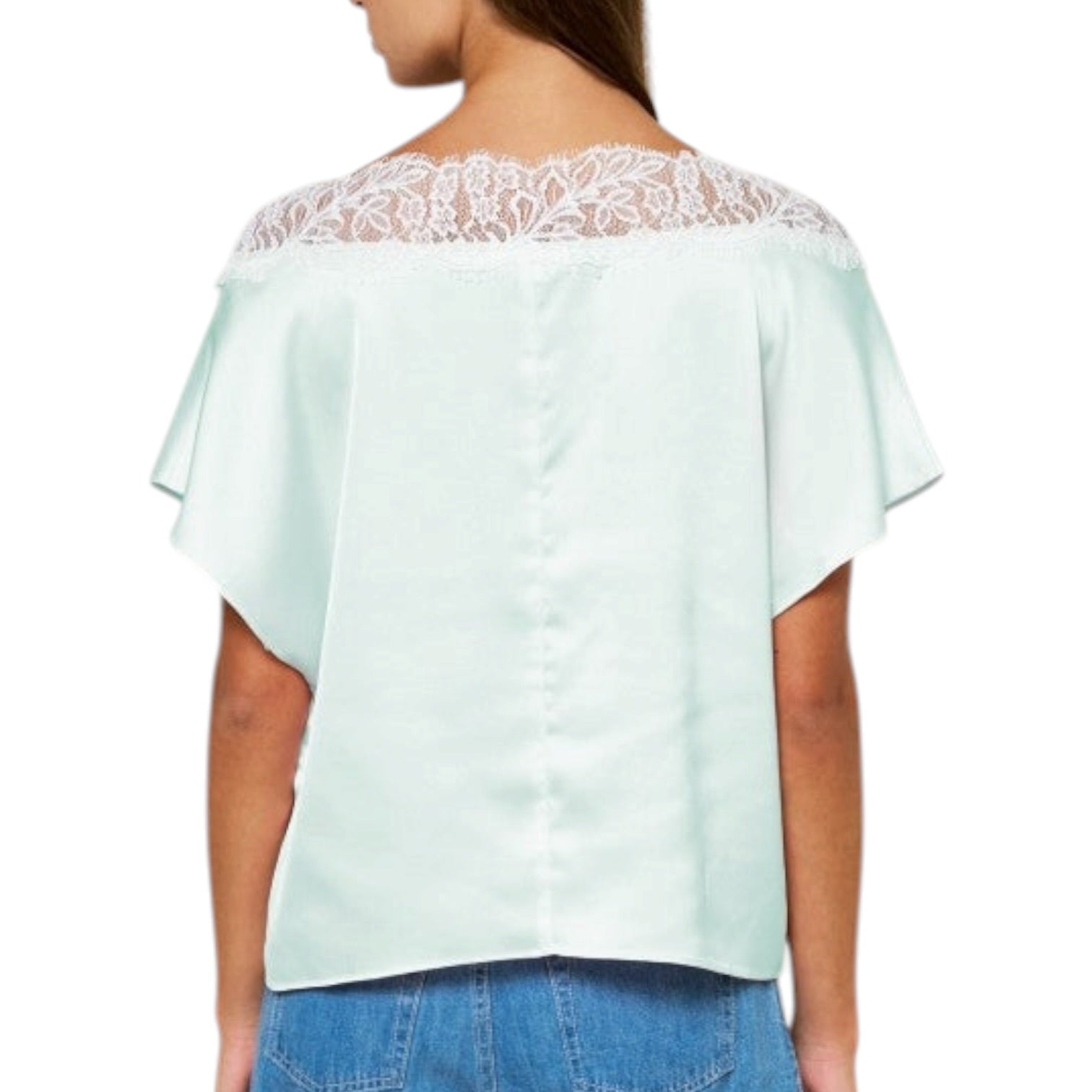 Light blue blouse with lace detailing on a white background