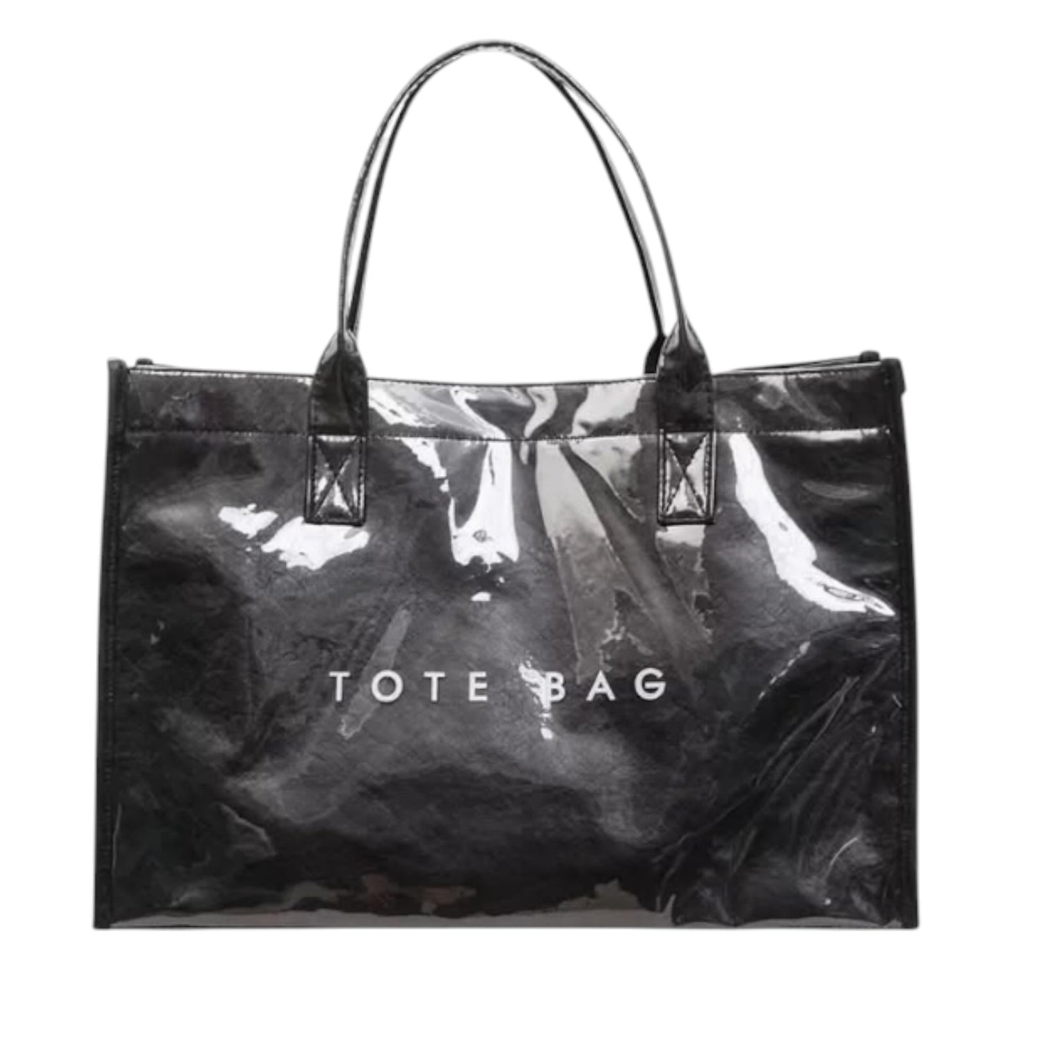 A glossy black patent leather tote bag with double top handles and 'TOTE BAG' printed in white across the front, shown on a plain white background.