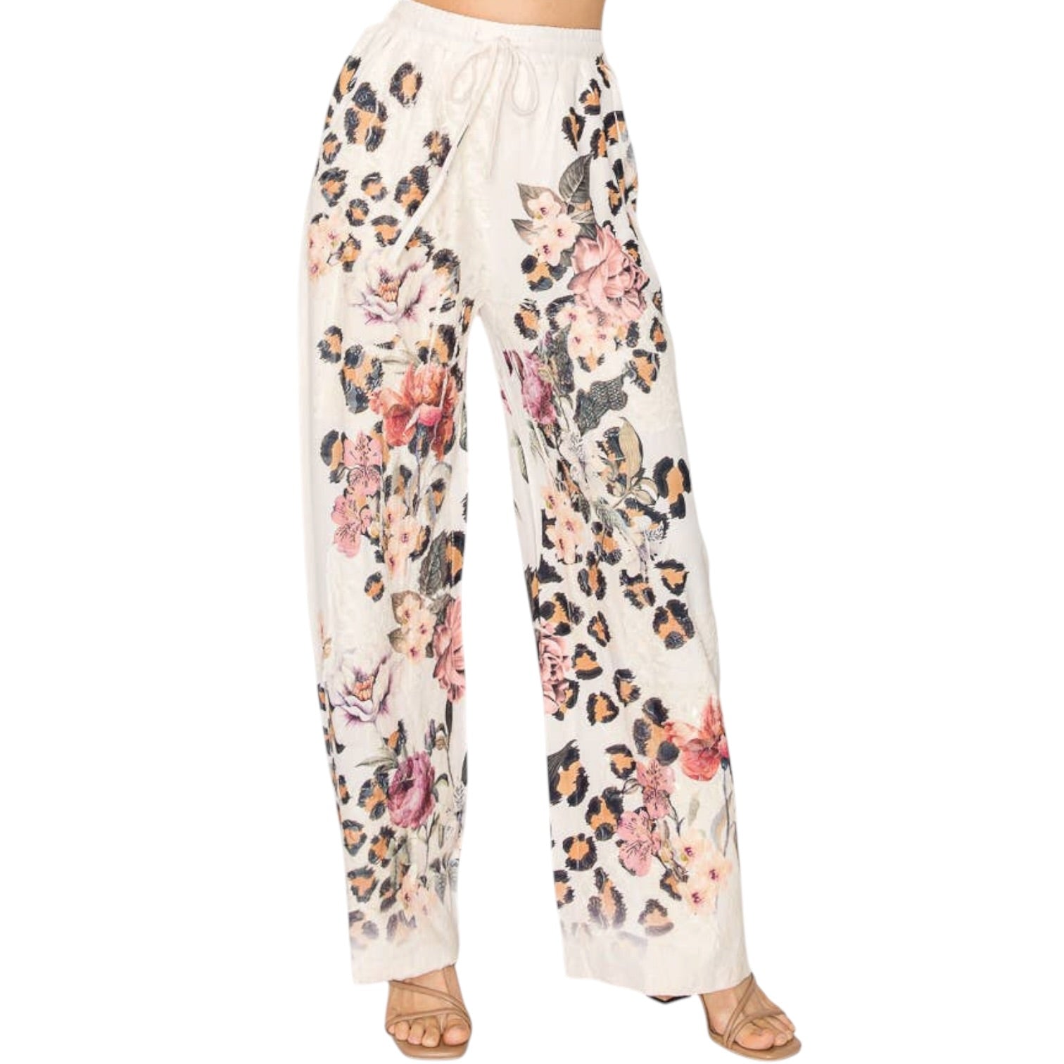 Floral and leopard print pants on a white background