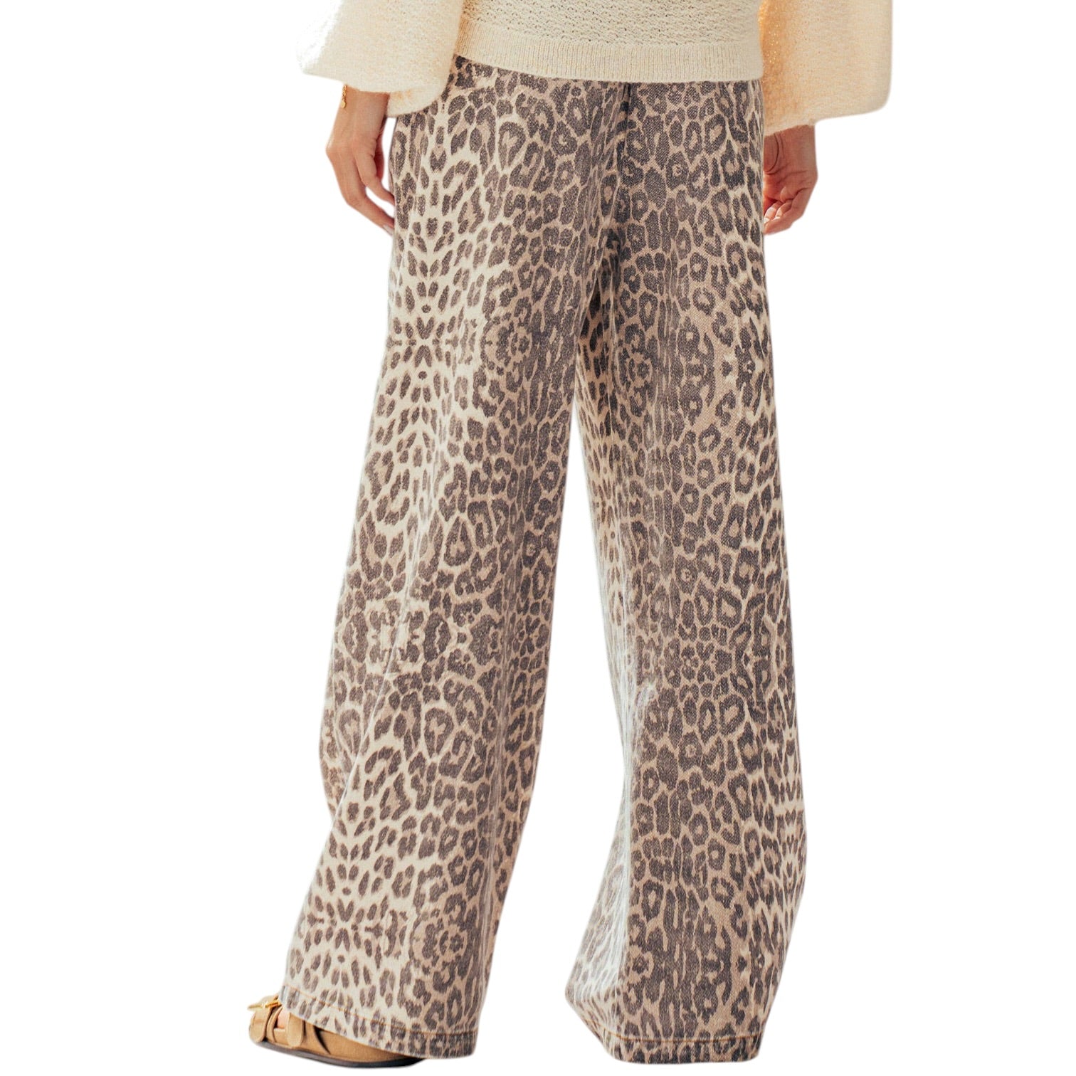 Leopard print pants worn by a person on a white background
