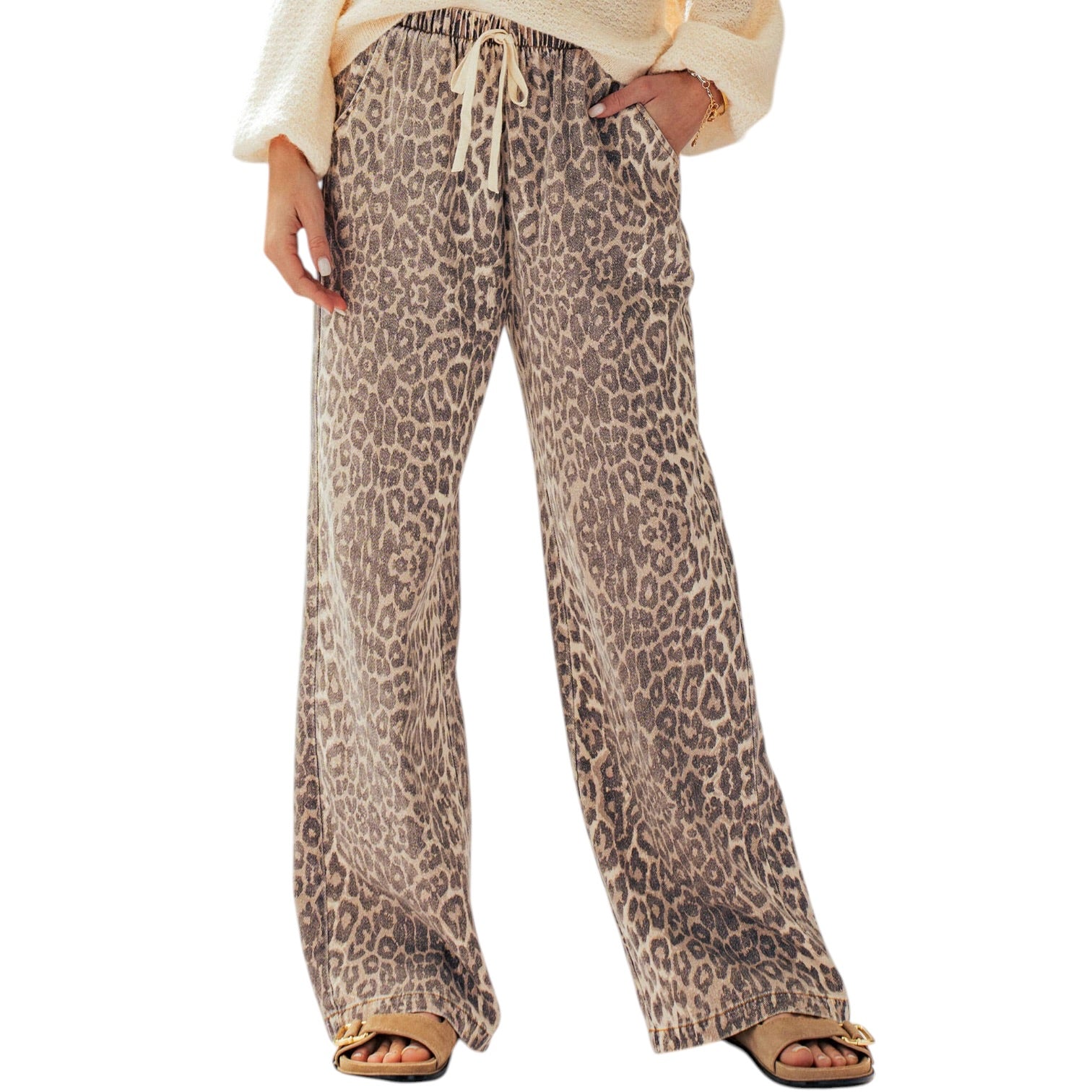 Leopard print pants worn by a person on a white background