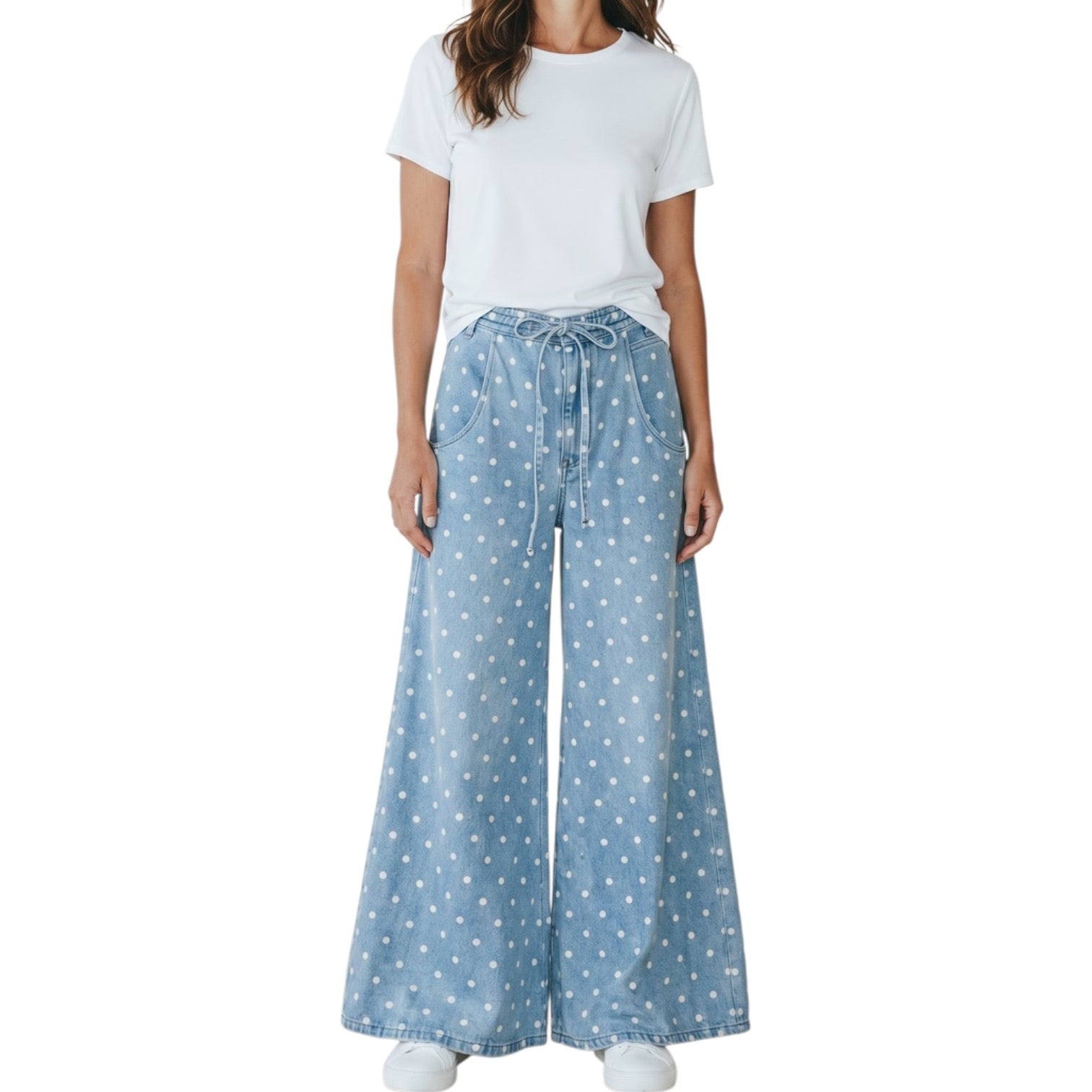 woman wearing light denim polka dot wide leg pants on white background