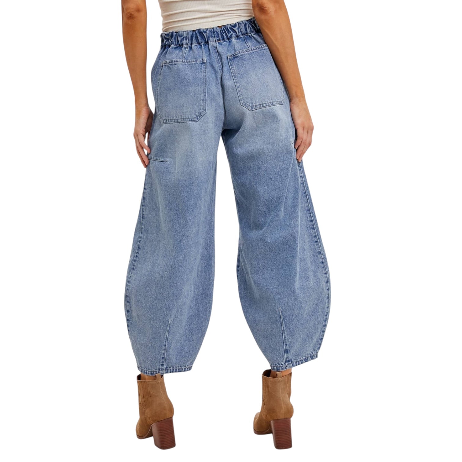 Light blue denim wide-leg pants worn by a person on a white background