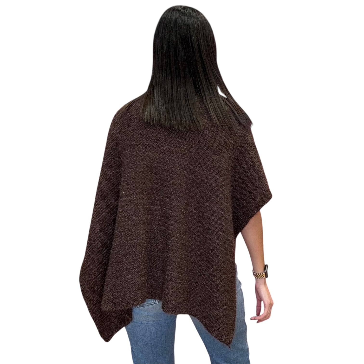Woman wearing a brown poncho
