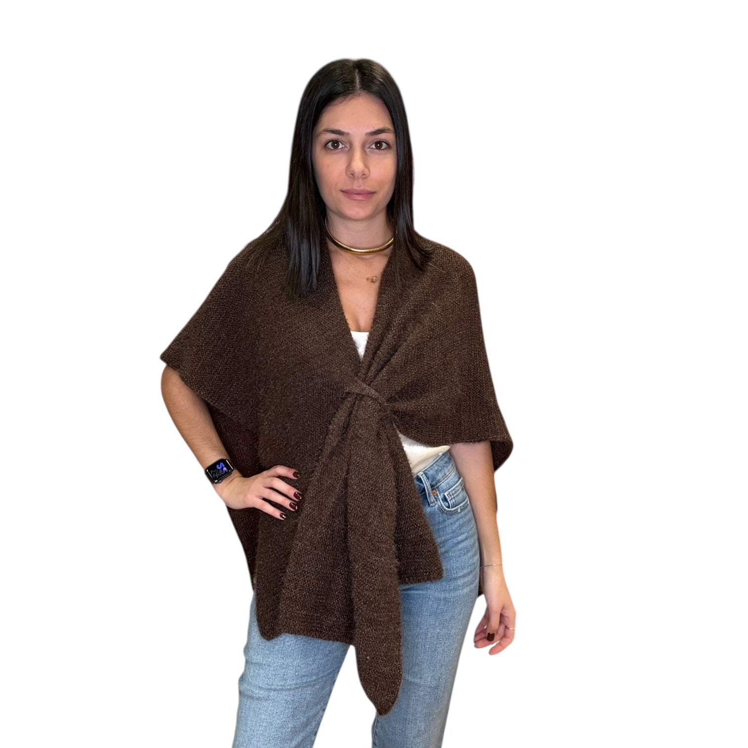 Woman wearing a brown poncho