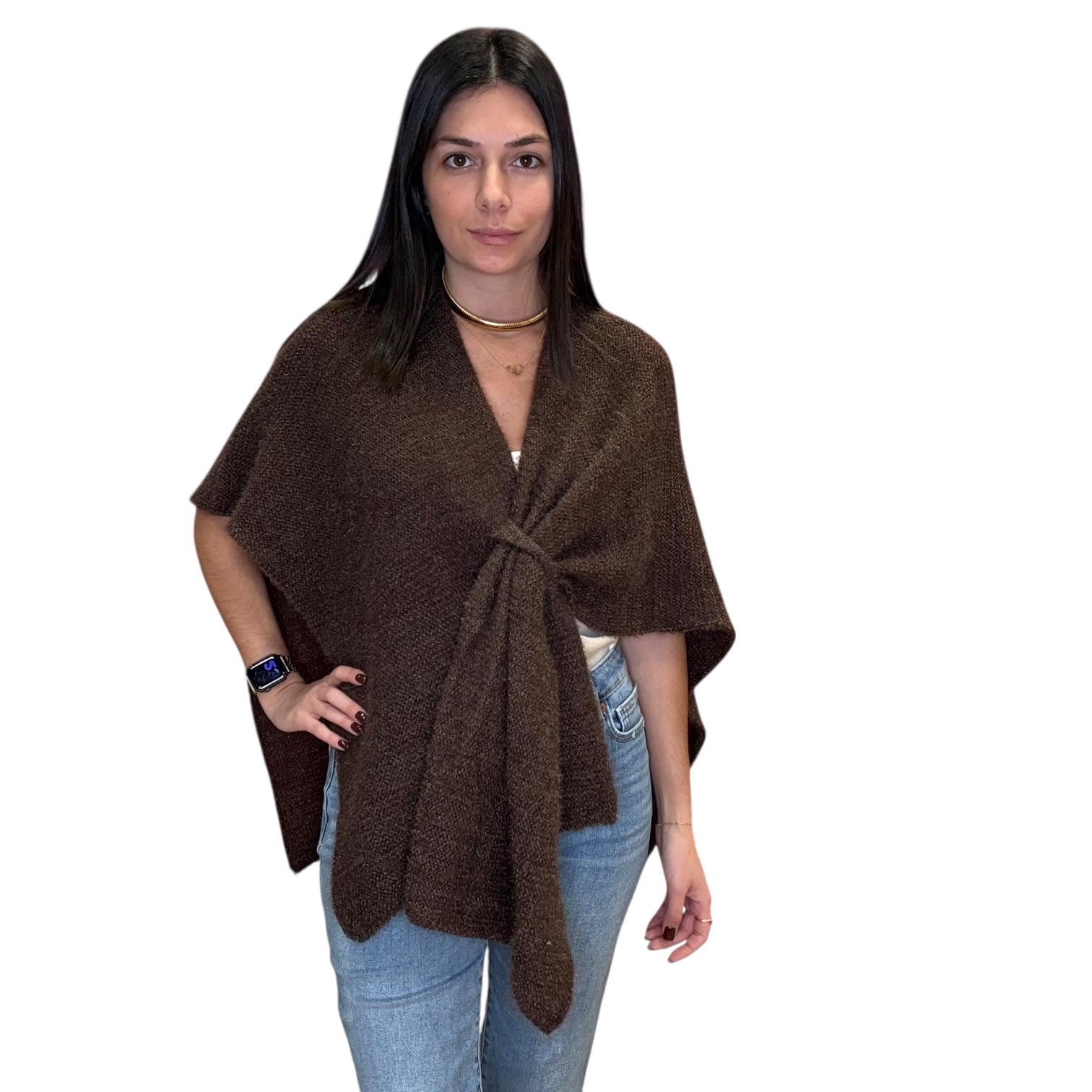 Woman wearing a brown poncho
