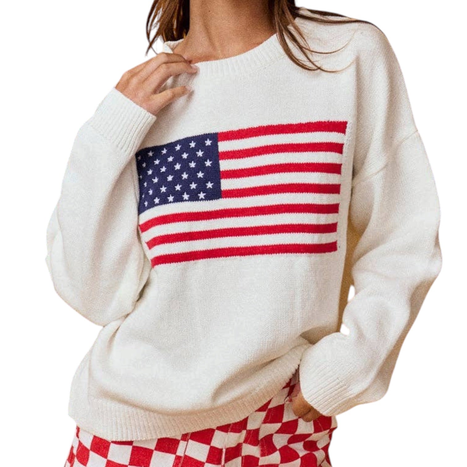 a woman wearing an american flag sweater on a white background