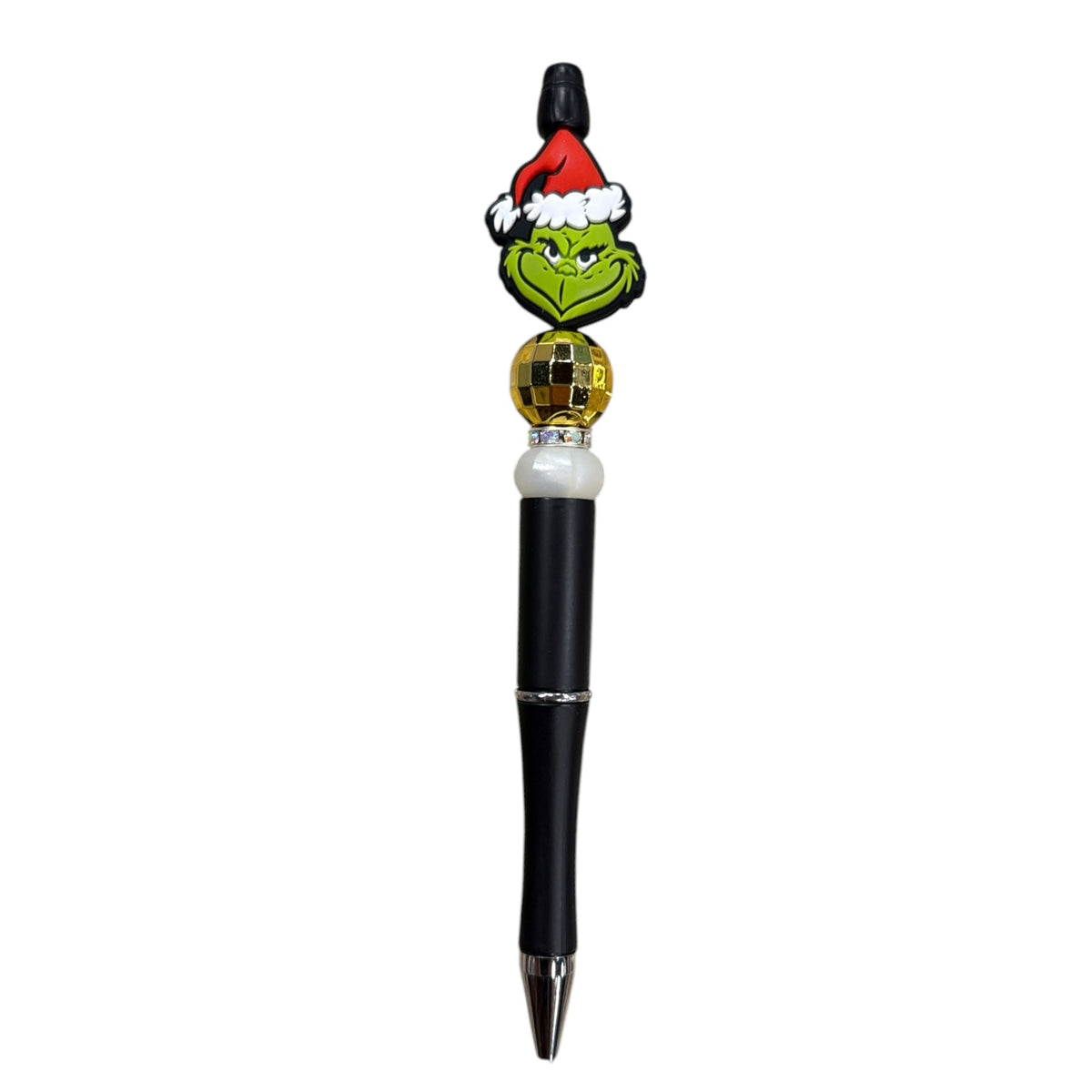 Pen with Grinch-themed top on a white background
