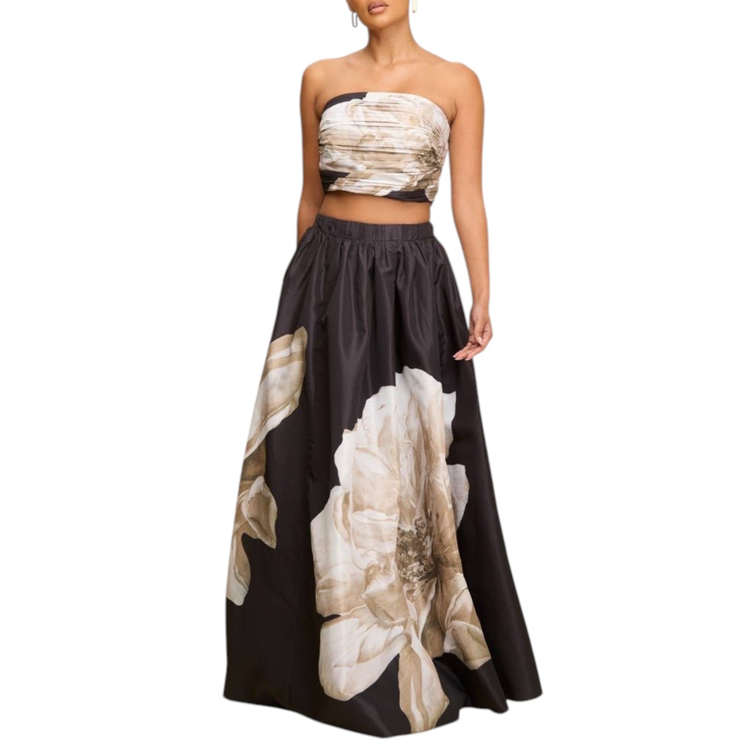 Two-piece outfit with strapless top and floral skirt on a white background