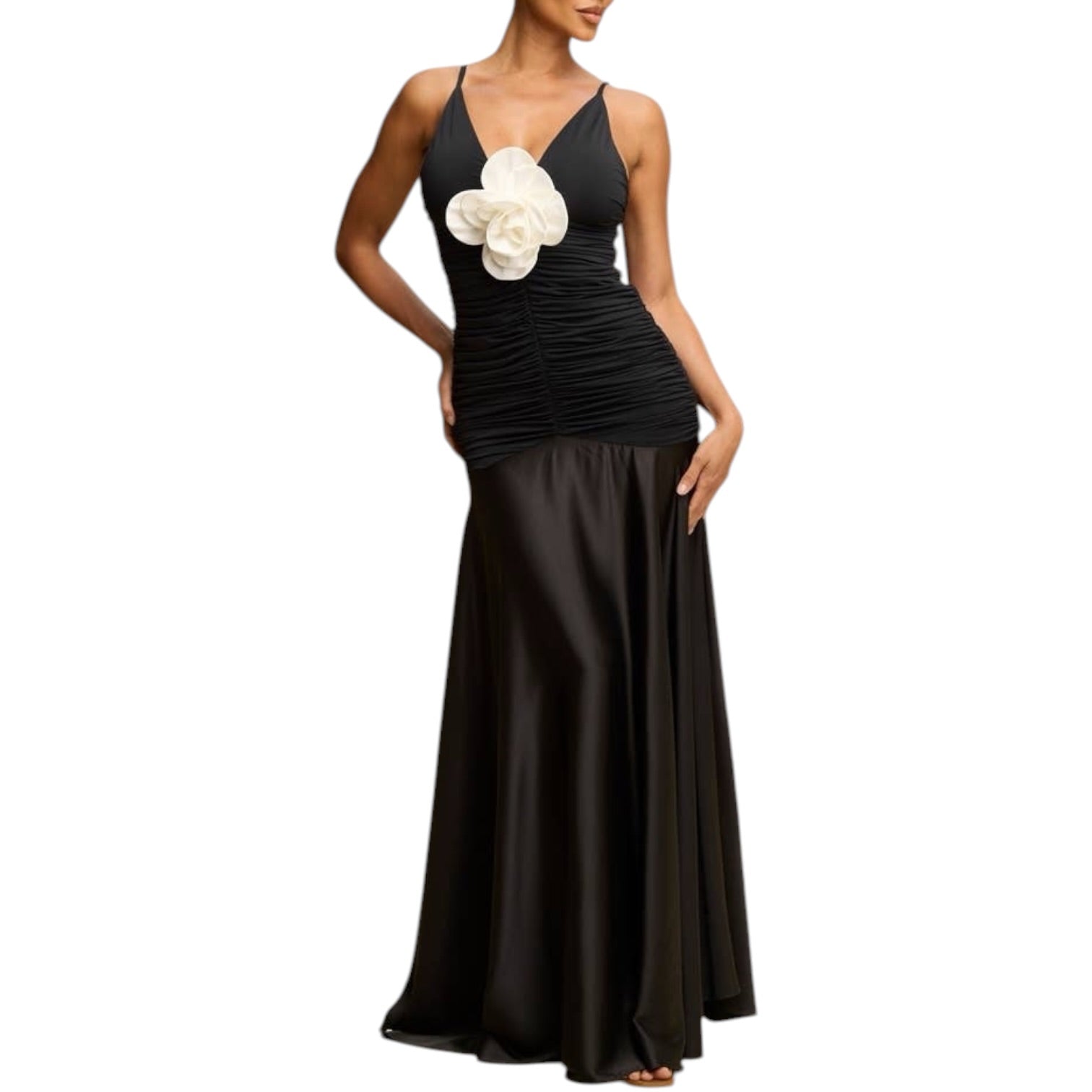 Black evening gown with a white floral accent on a white background