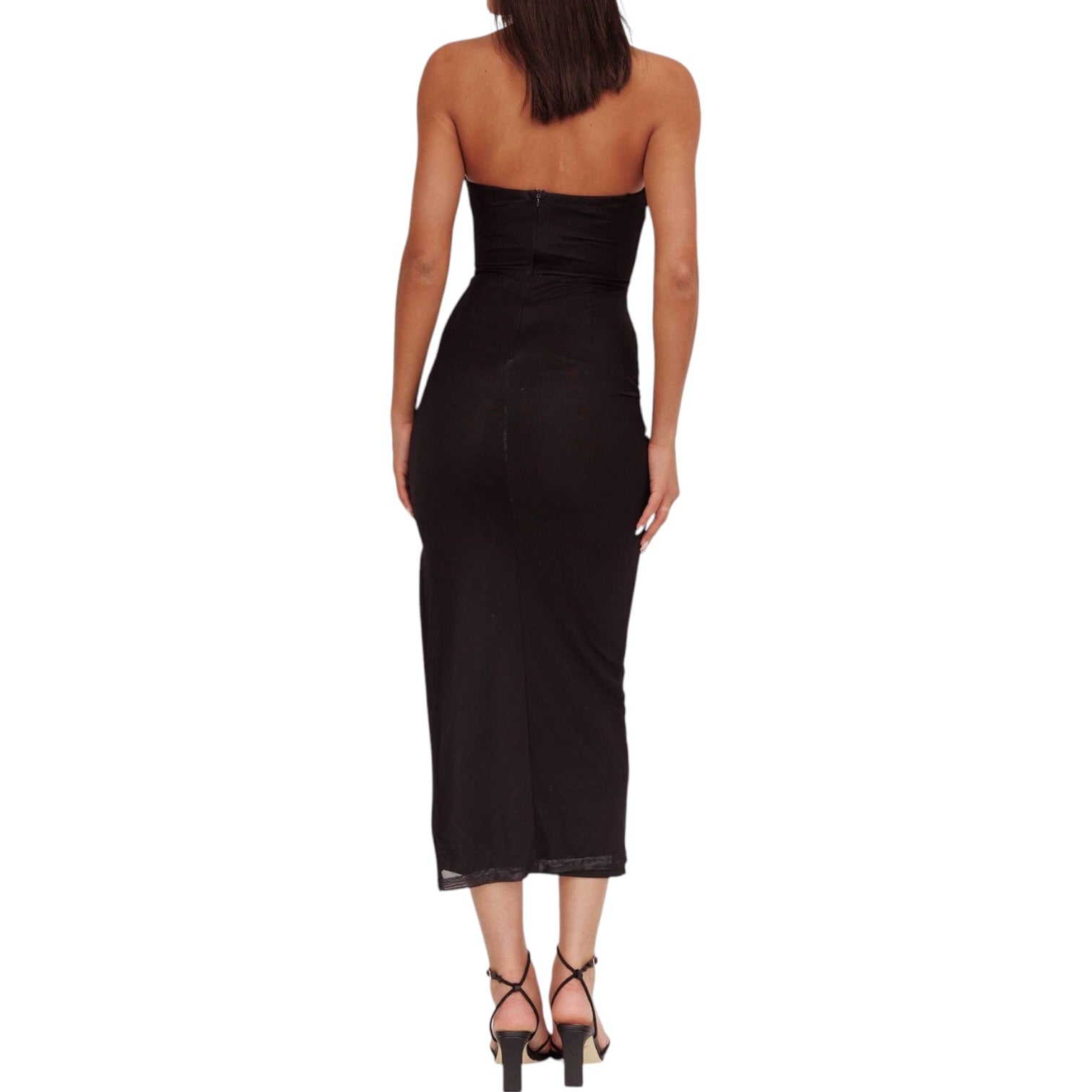 Black strapless dress worn by a model on a white background