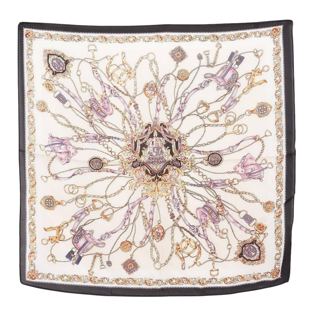 Decorative square scarf with intricate jewelry-themed design on a white background