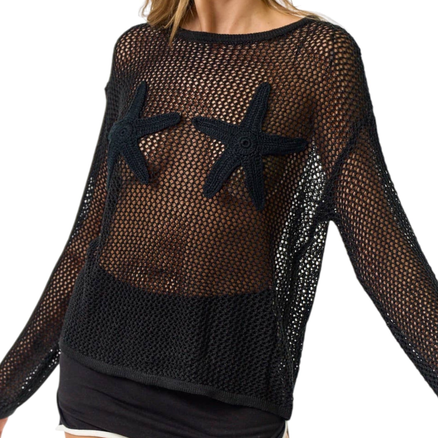 Black mesh top with starfish designs on a white background