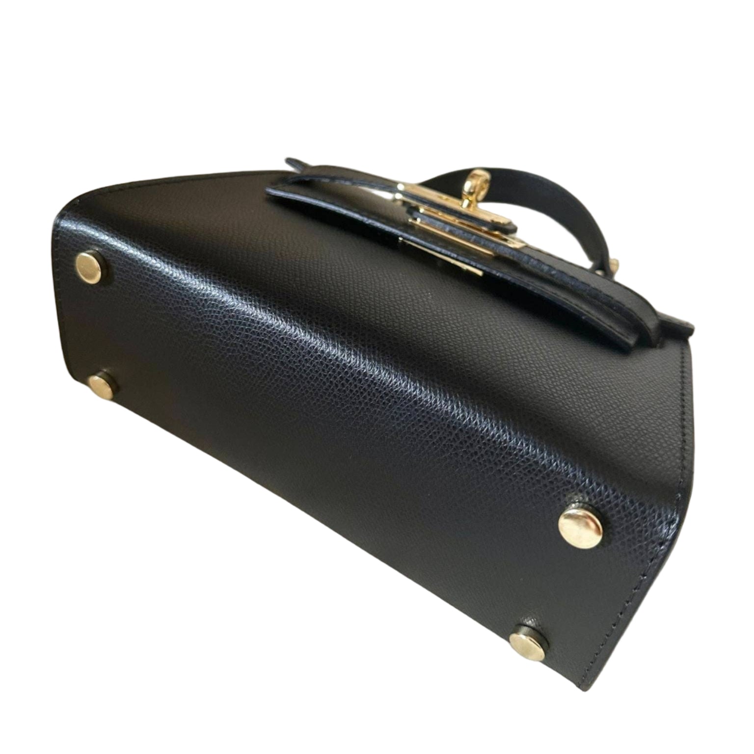 Black handbag with gold accents on a white background