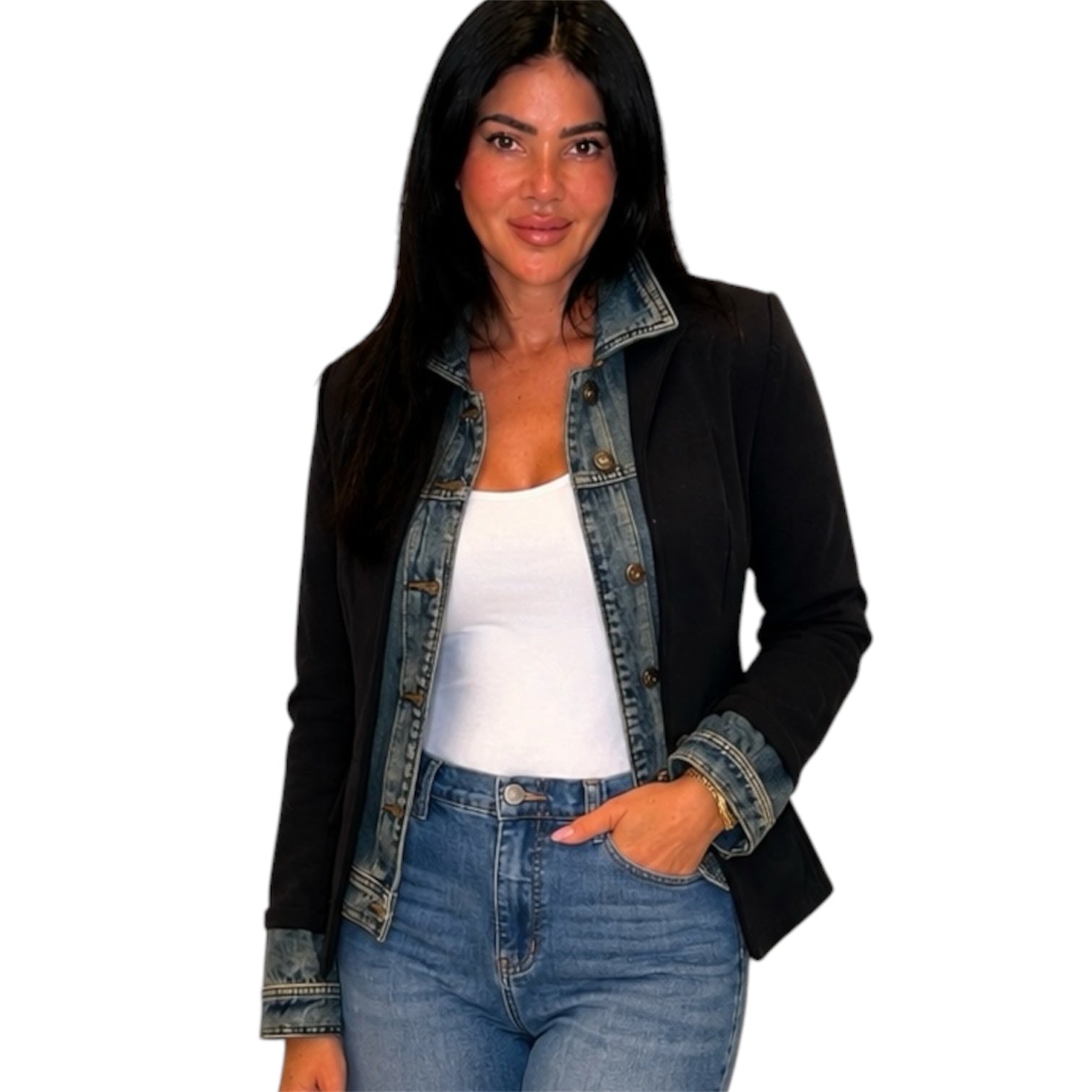 Woman wearing a black jacket over a white top and blue jeans on a white background