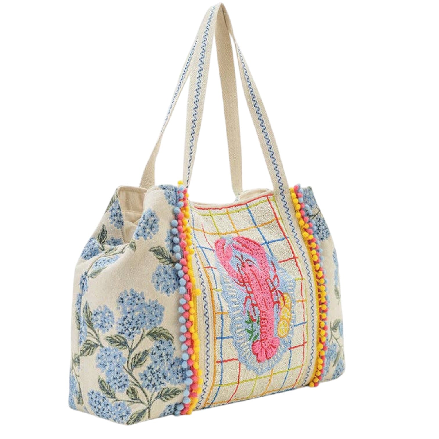 Colorful tote bag with floral design and embroidered character on a white background