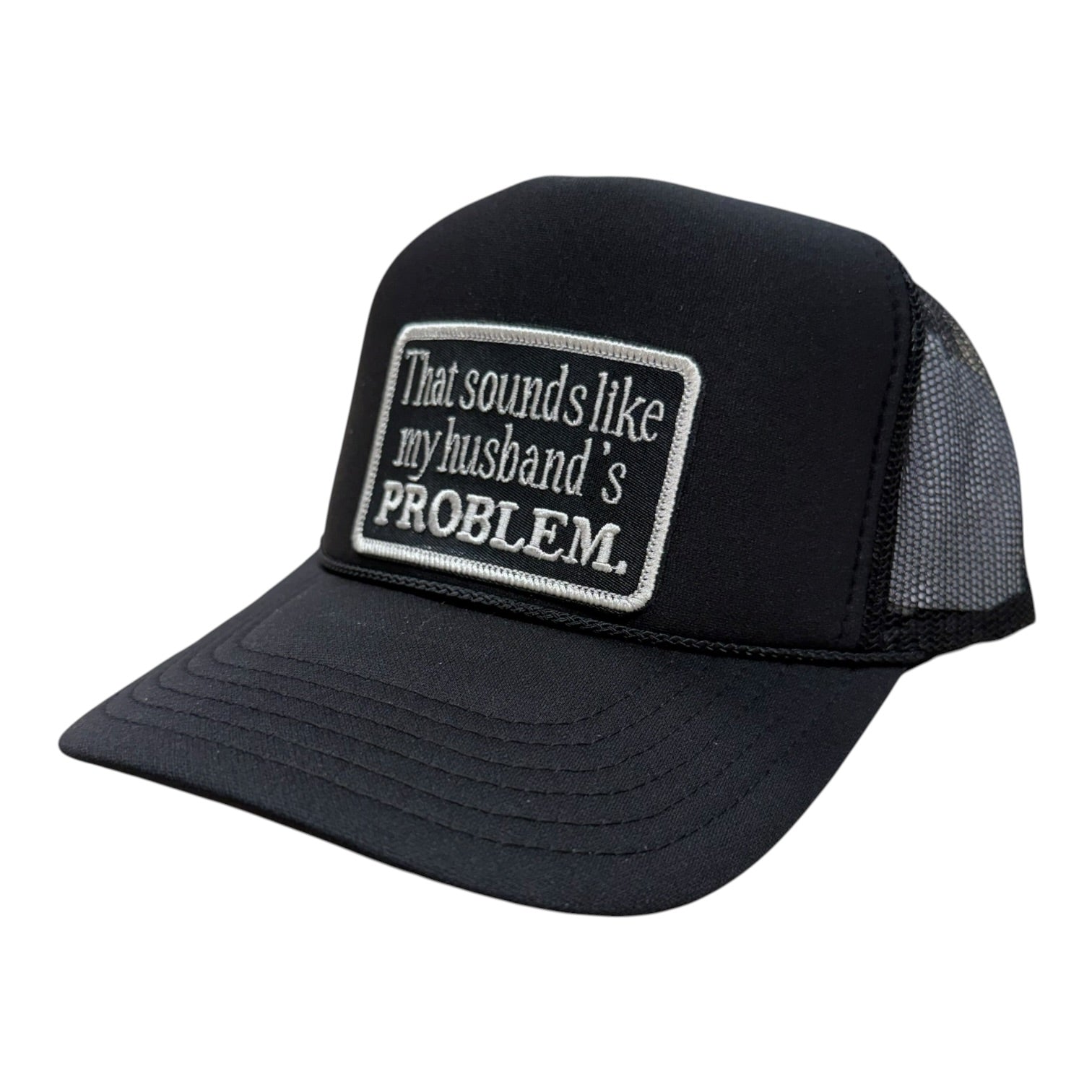 Black trucker cap with a white patch on a white background