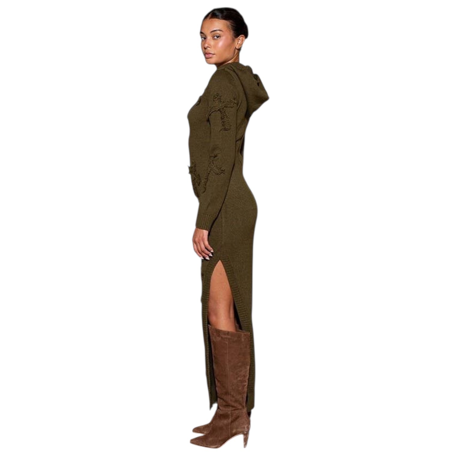 Woman wearing a long olive green dress with a high slit and brown knee-high boots on a white background