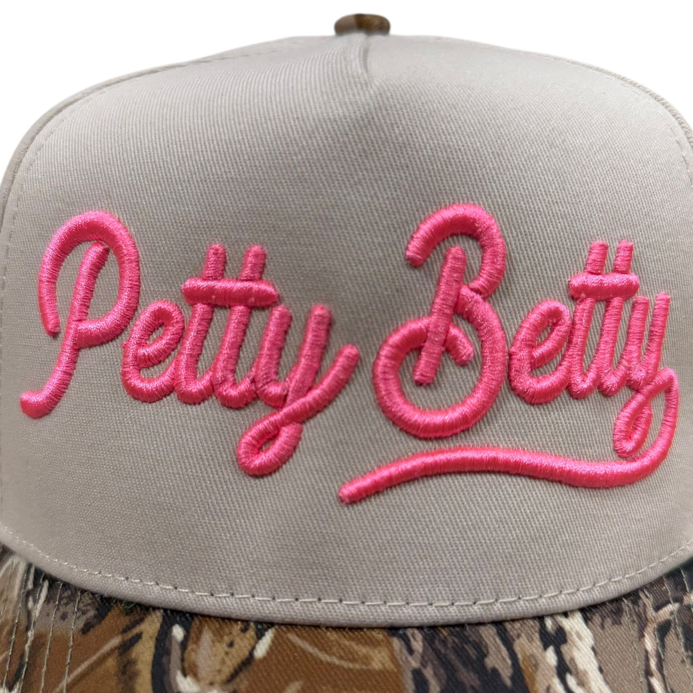real tree brim trucker hat with "Petty Betty" embroidered in pink