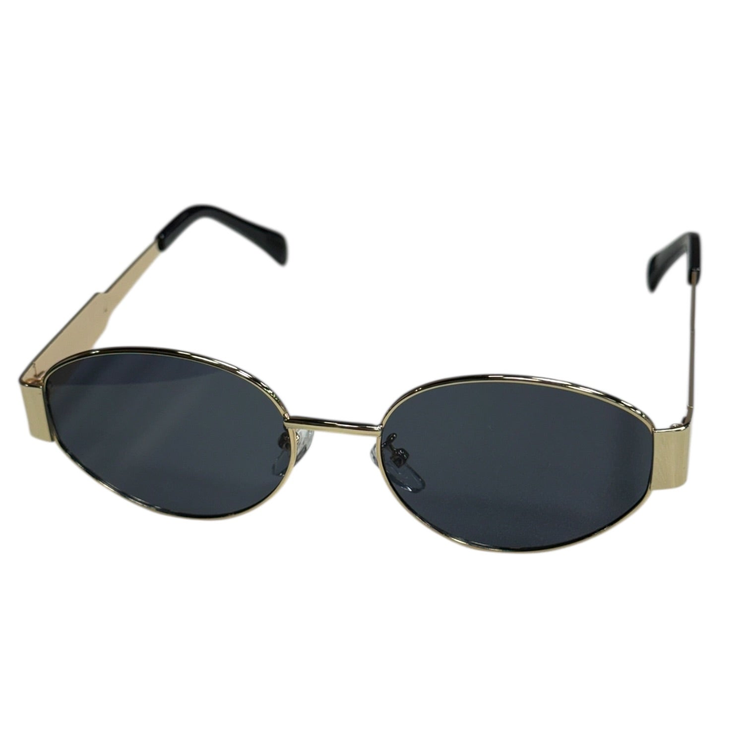 Sunglasses with gold frame and dark lenses on a white background
