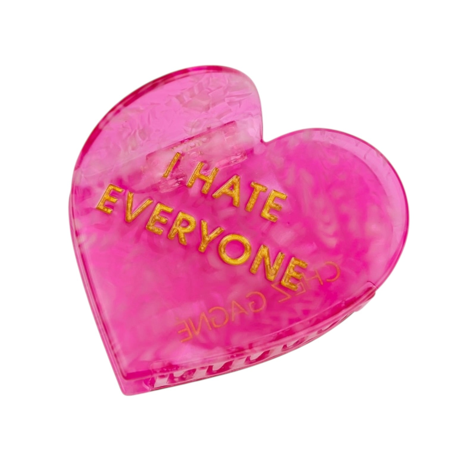 Pink heart-shaped object with 'I HATE EVERYONE' text on a white background