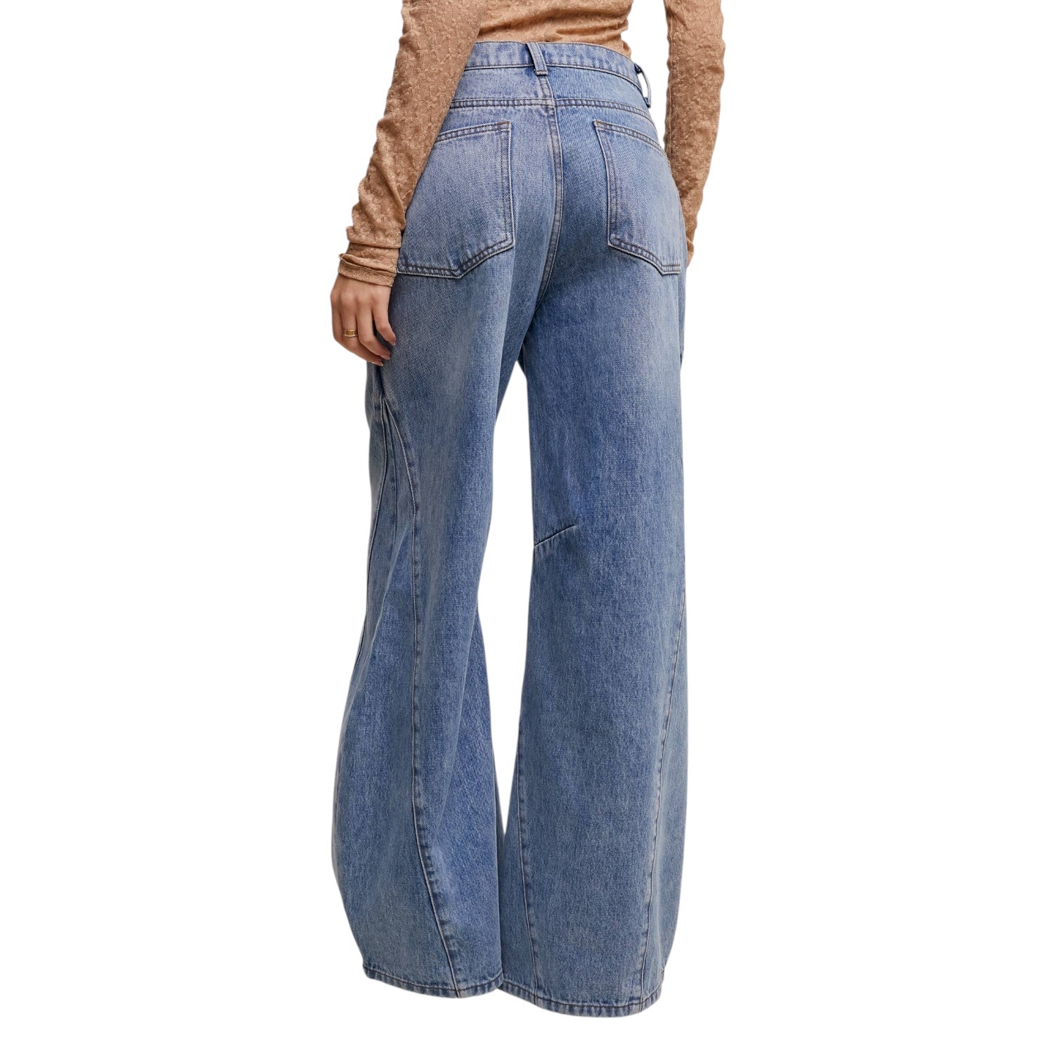 Blue jeans worn by a person on a white background