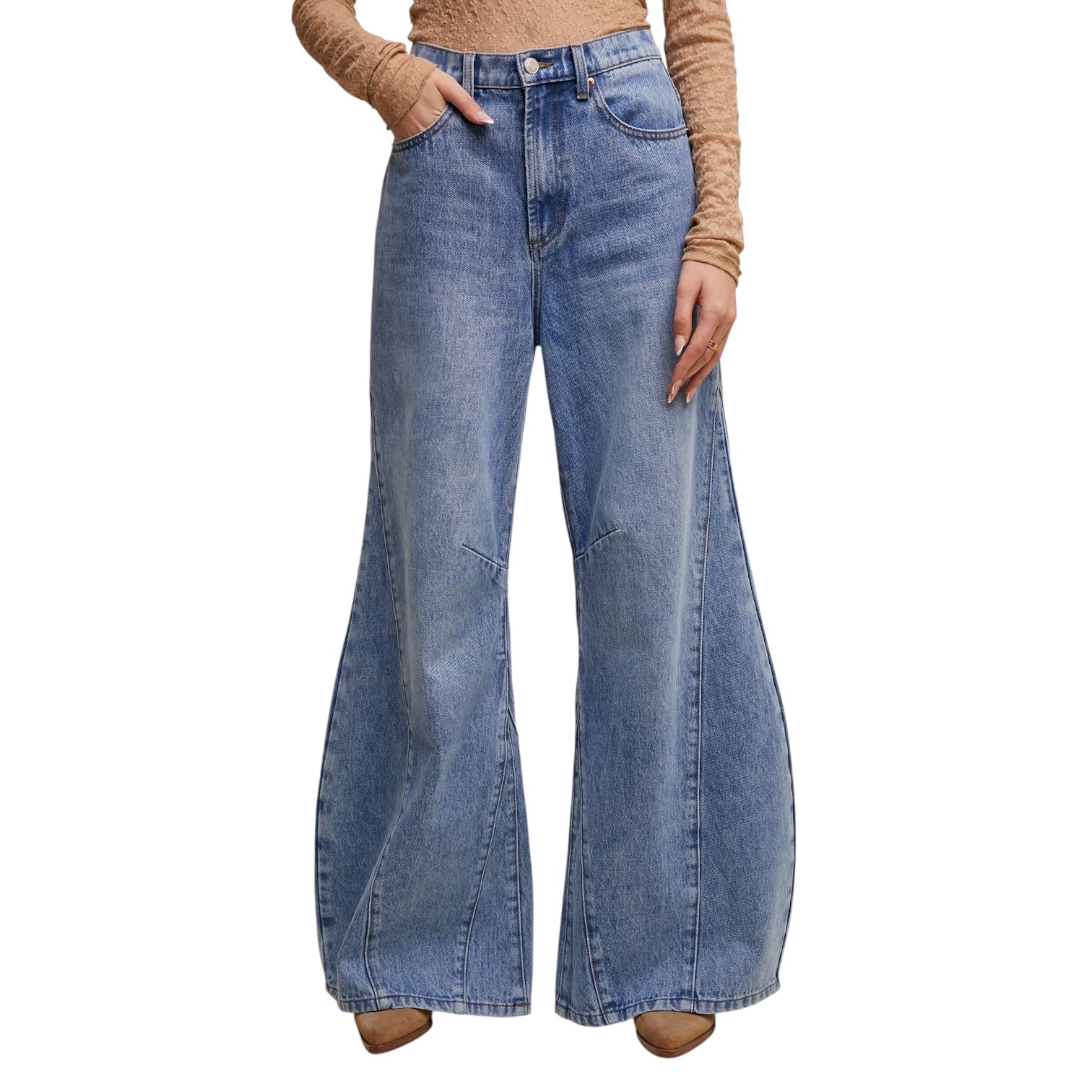 Blue wide-leg jeans worn by a person on a white background