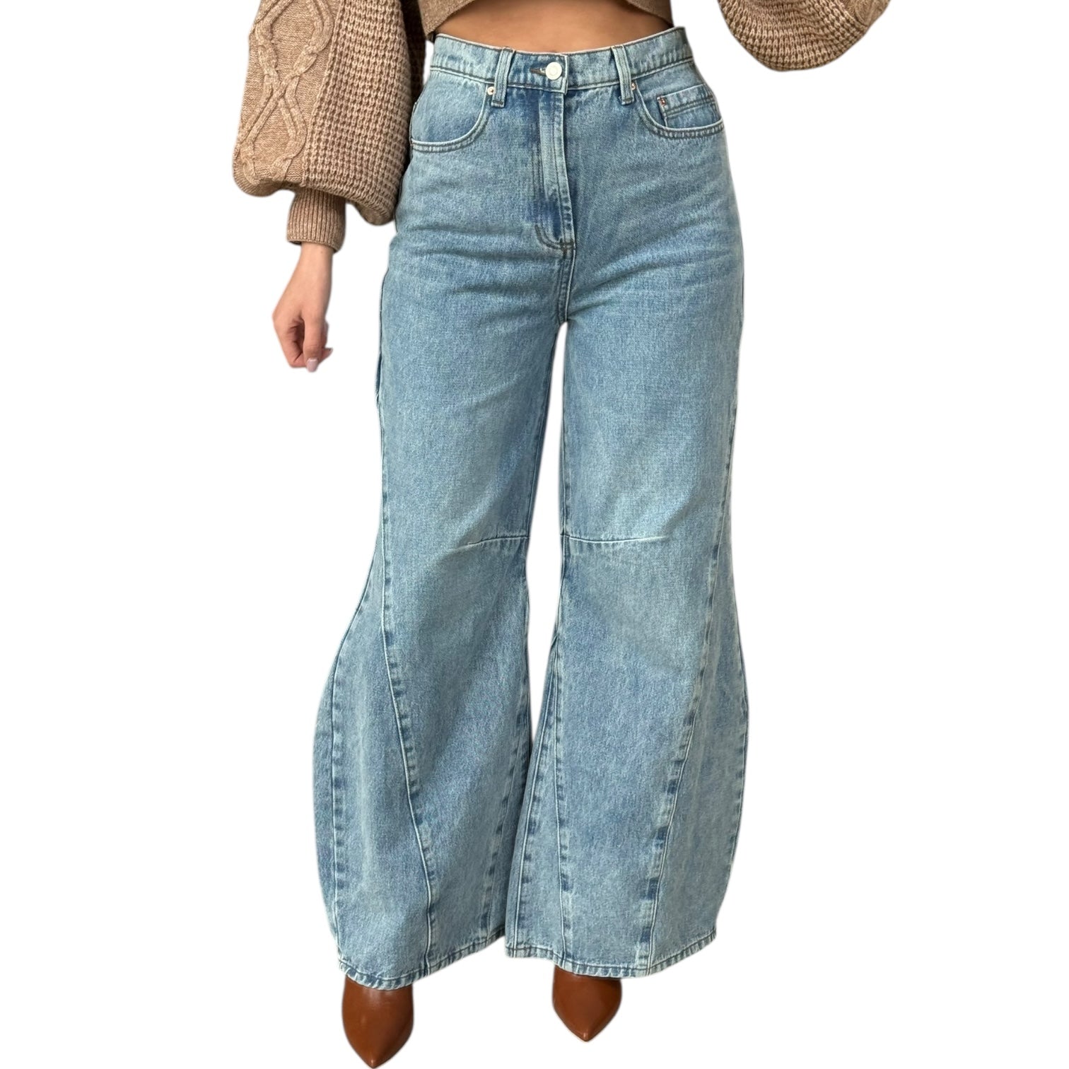 Wide-leg jeans worn by a person on a white background