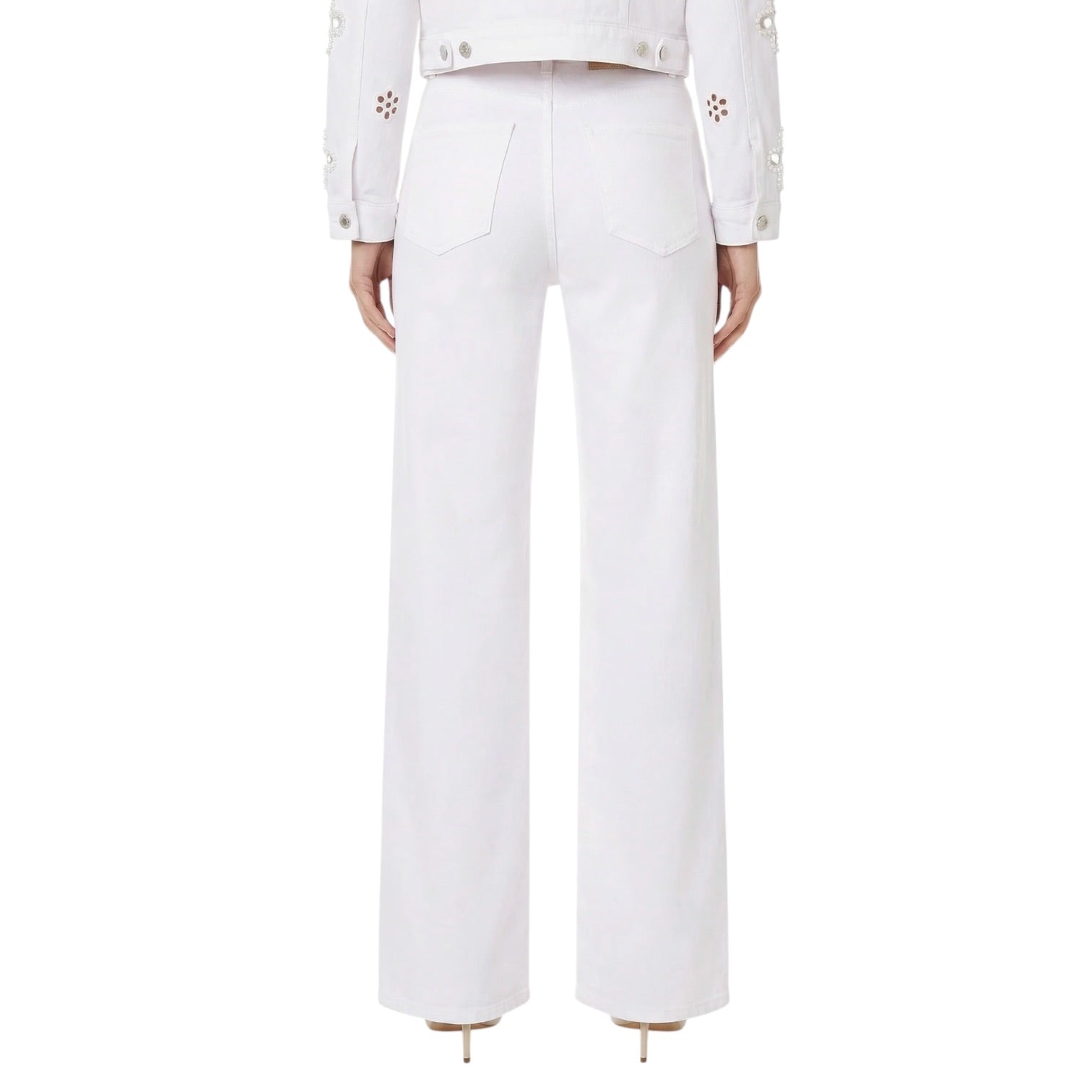 White pants worn by a person on a white background