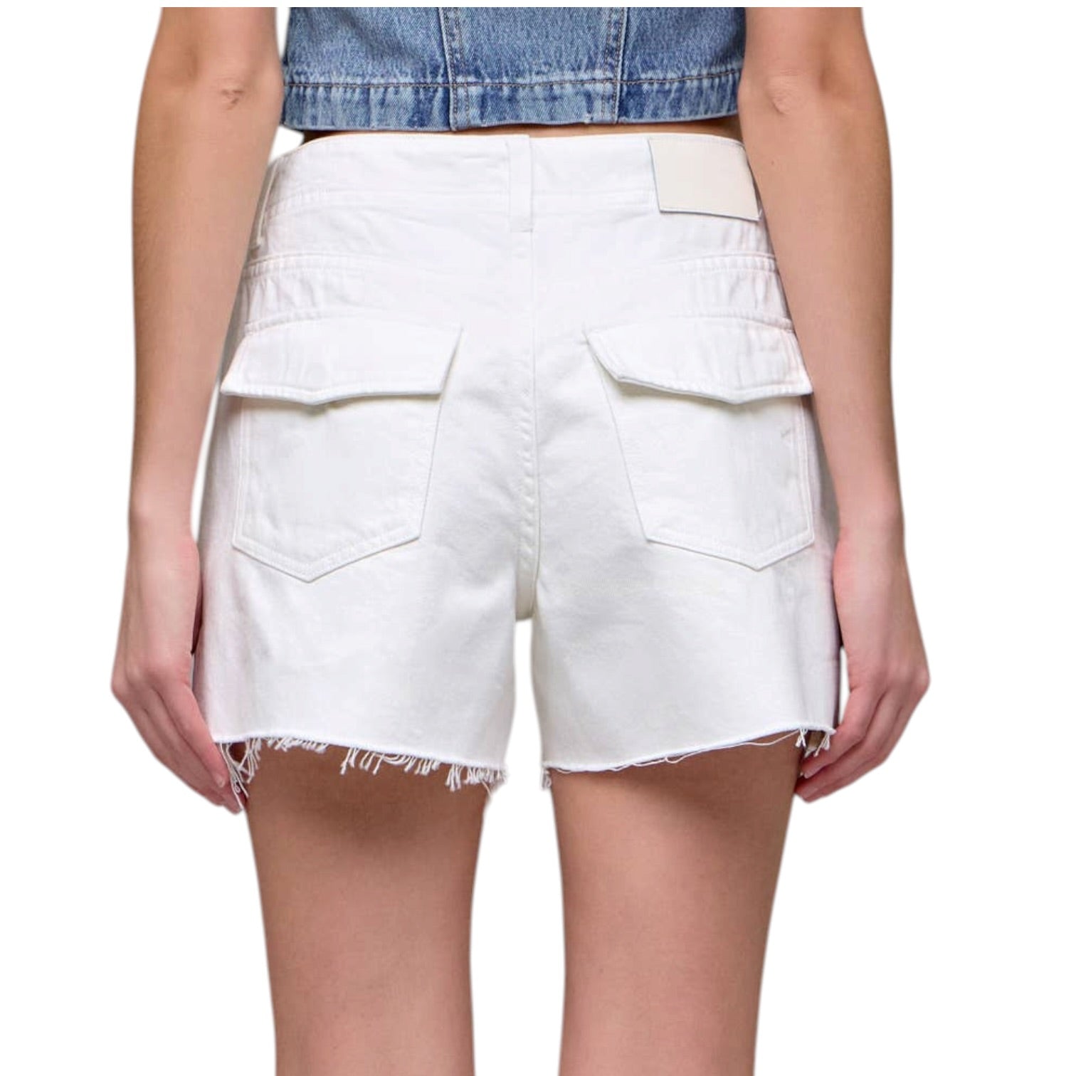 White denim shorts worn by a person on a white background