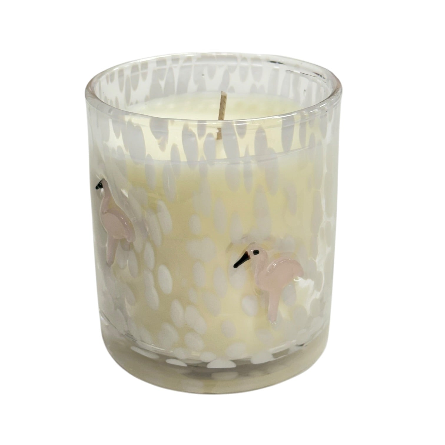 Candle in a glass holder with bird design on a white background