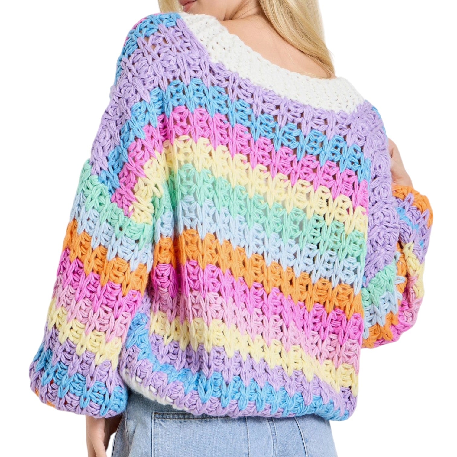 Multicolored crochet sweater worn by a person on a white background