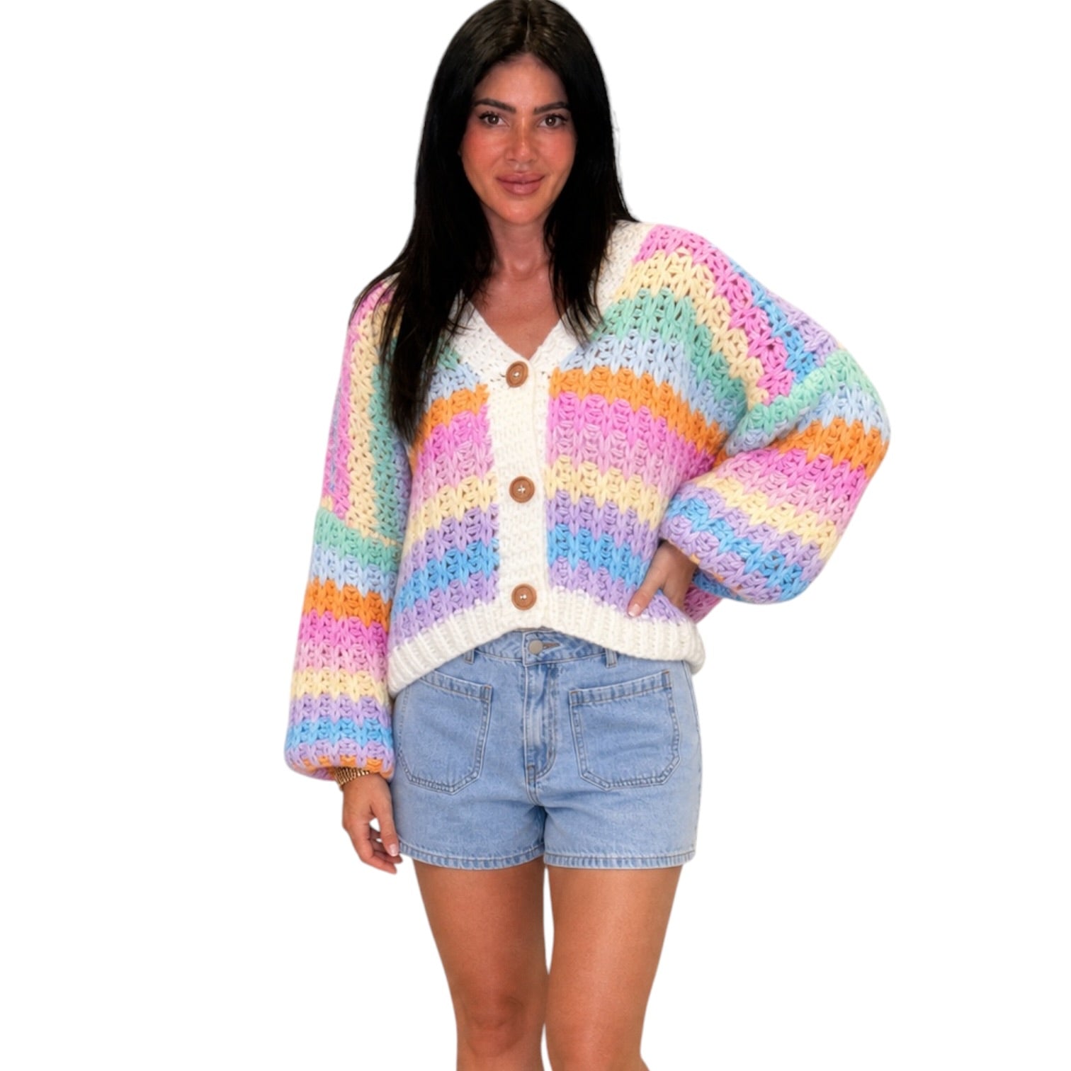 Multicolored crochet cardigan worn by a person on a white background