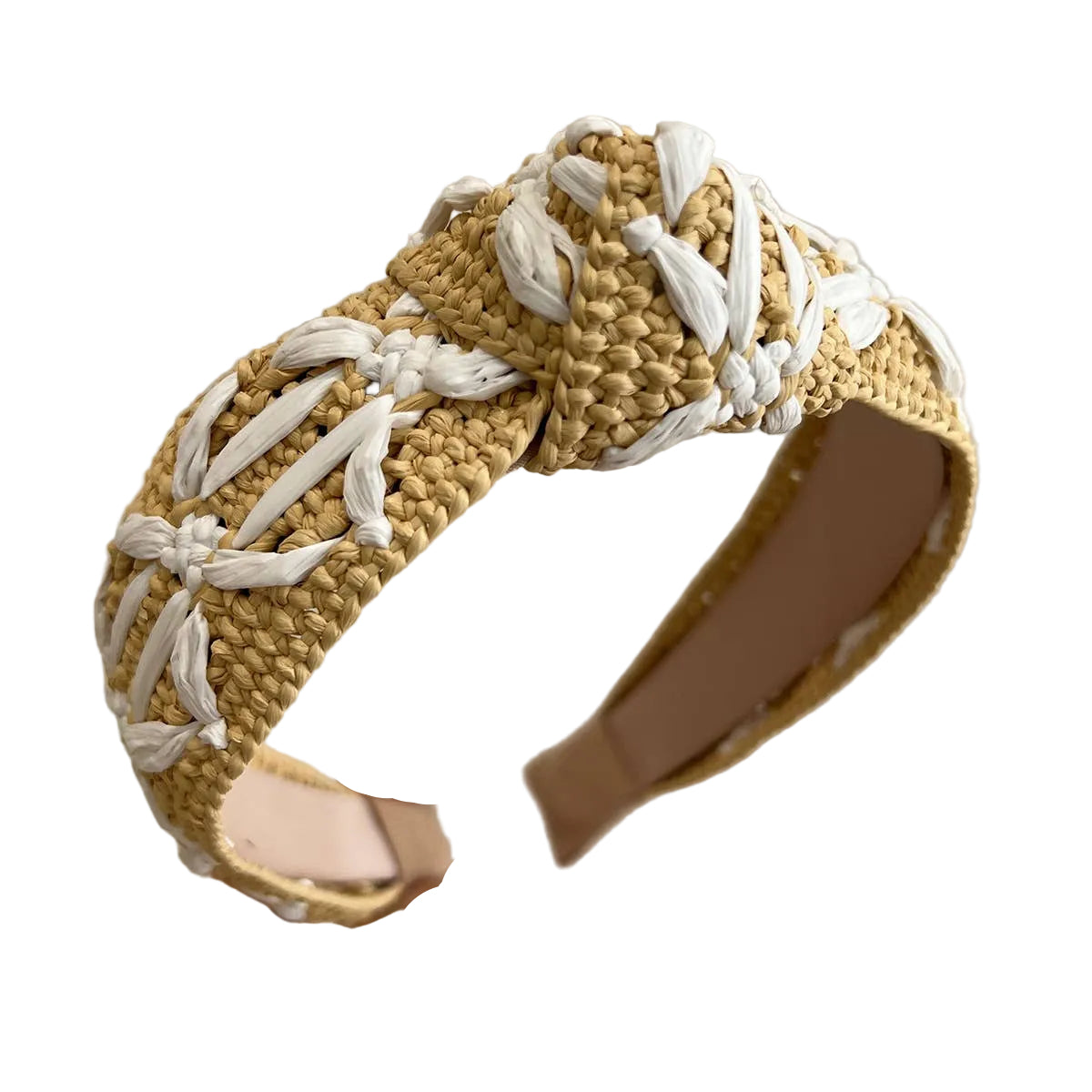 Beige and white woven headband held by a hand against a neutral background
