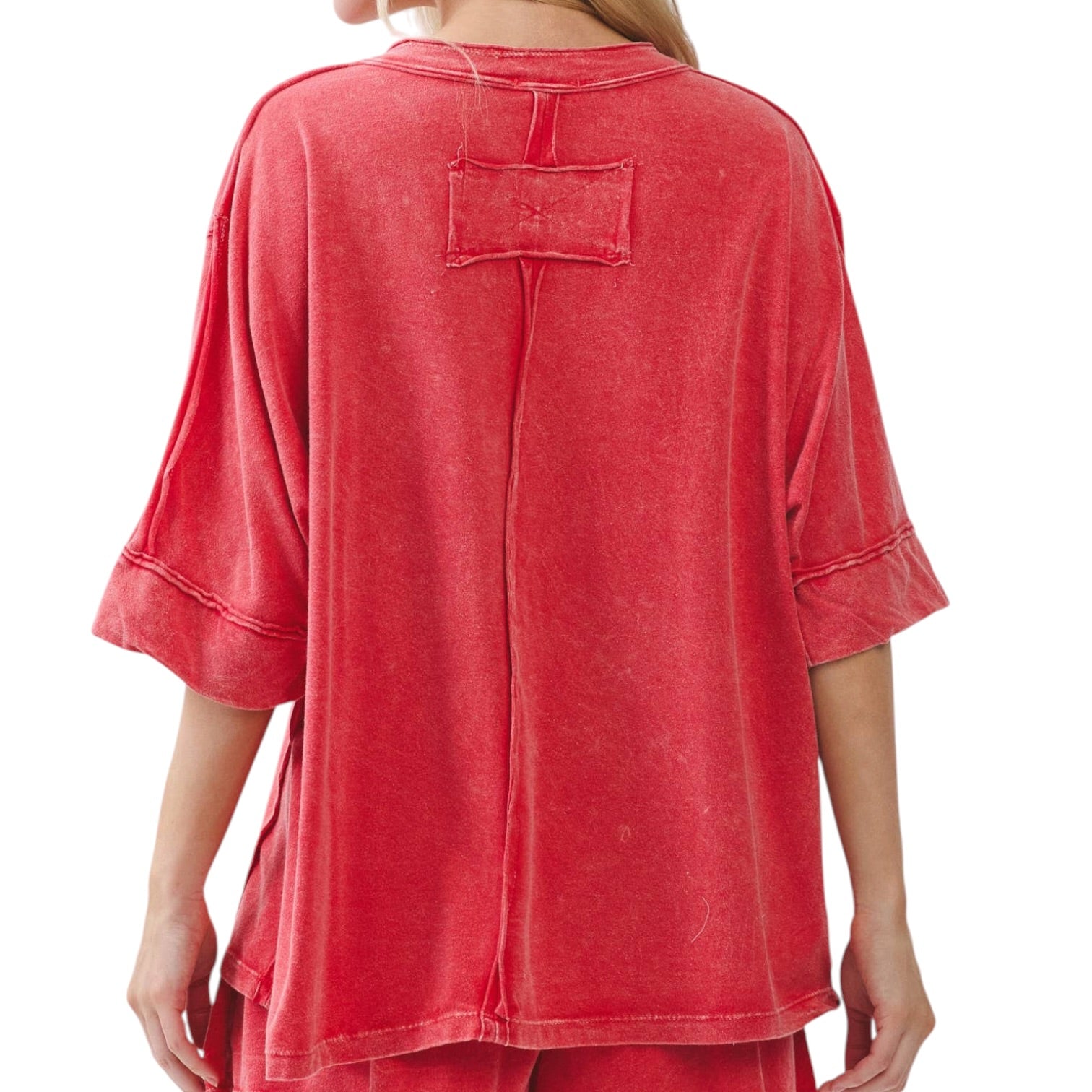 Red oversized shirt with a pocket on a white background