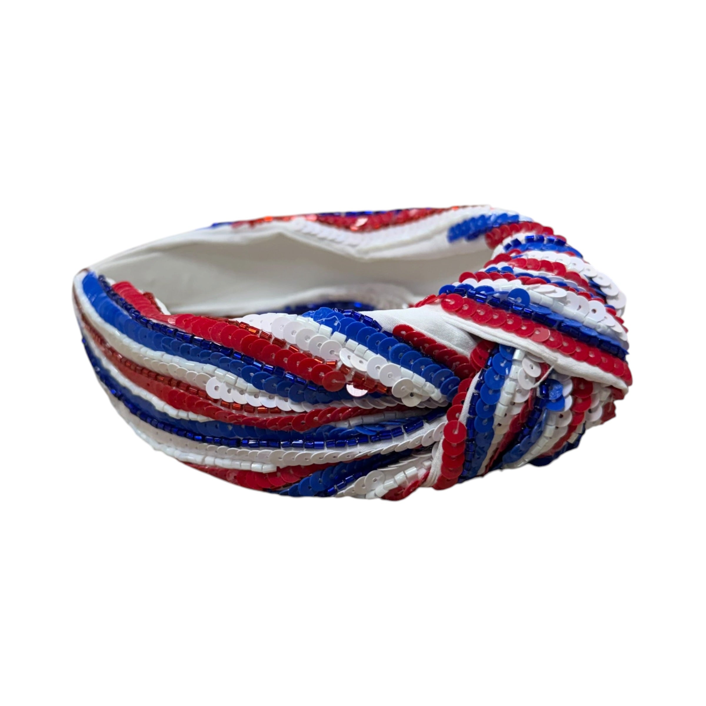 Headband with red, white, and blue pattern on a white background