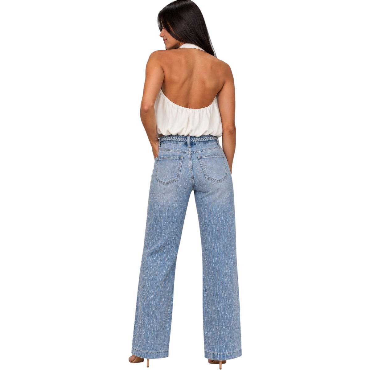 A woman shown from the back wearing light-wash wide-leg denim jeans and a white halter top, photographed against a plain white studio background.