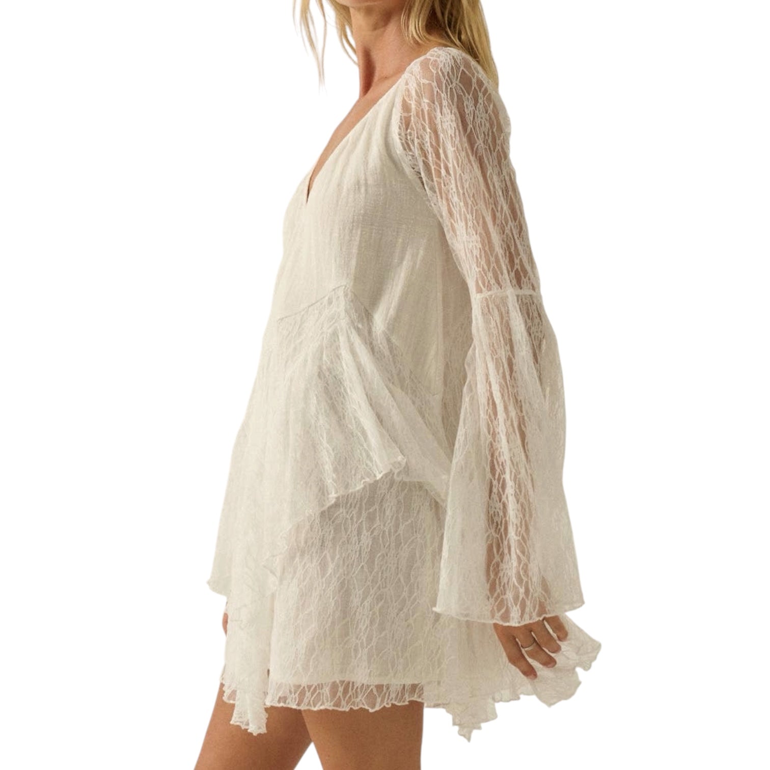 White lace romper with long sleeves on a white background