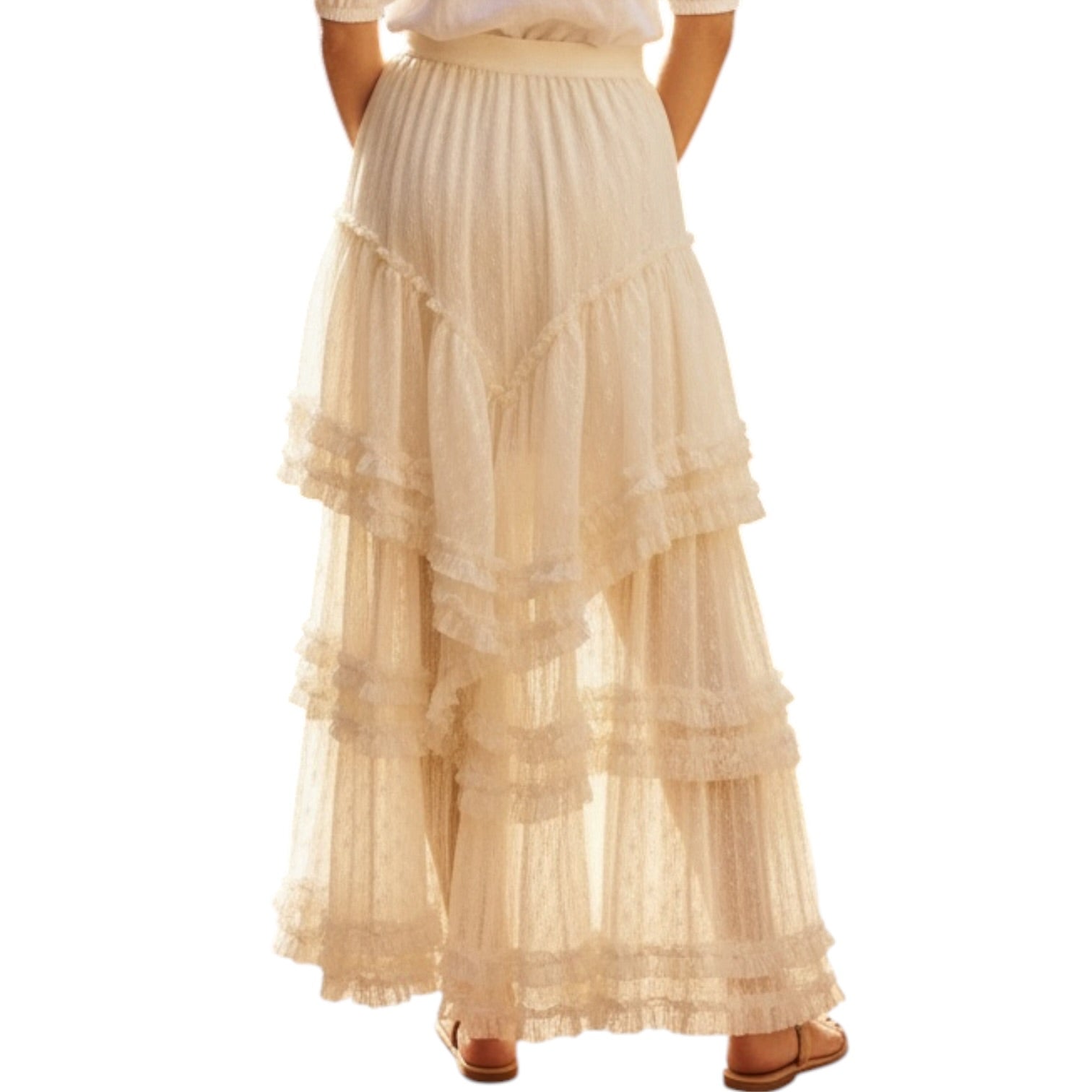 Beige ruffled skirt worn by a person on a white background