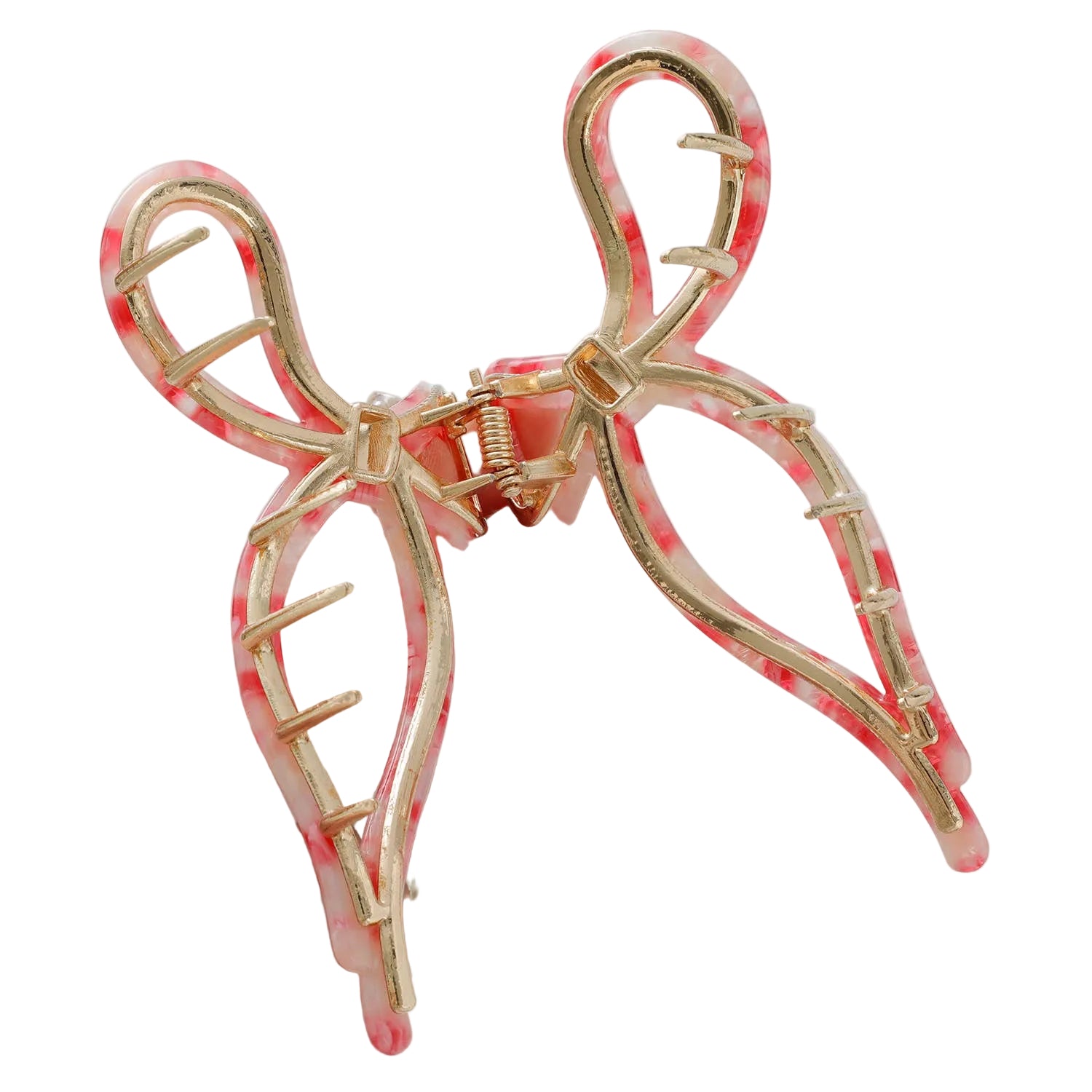 Hand holding a decorative hair clip with gold and pink design on a white background