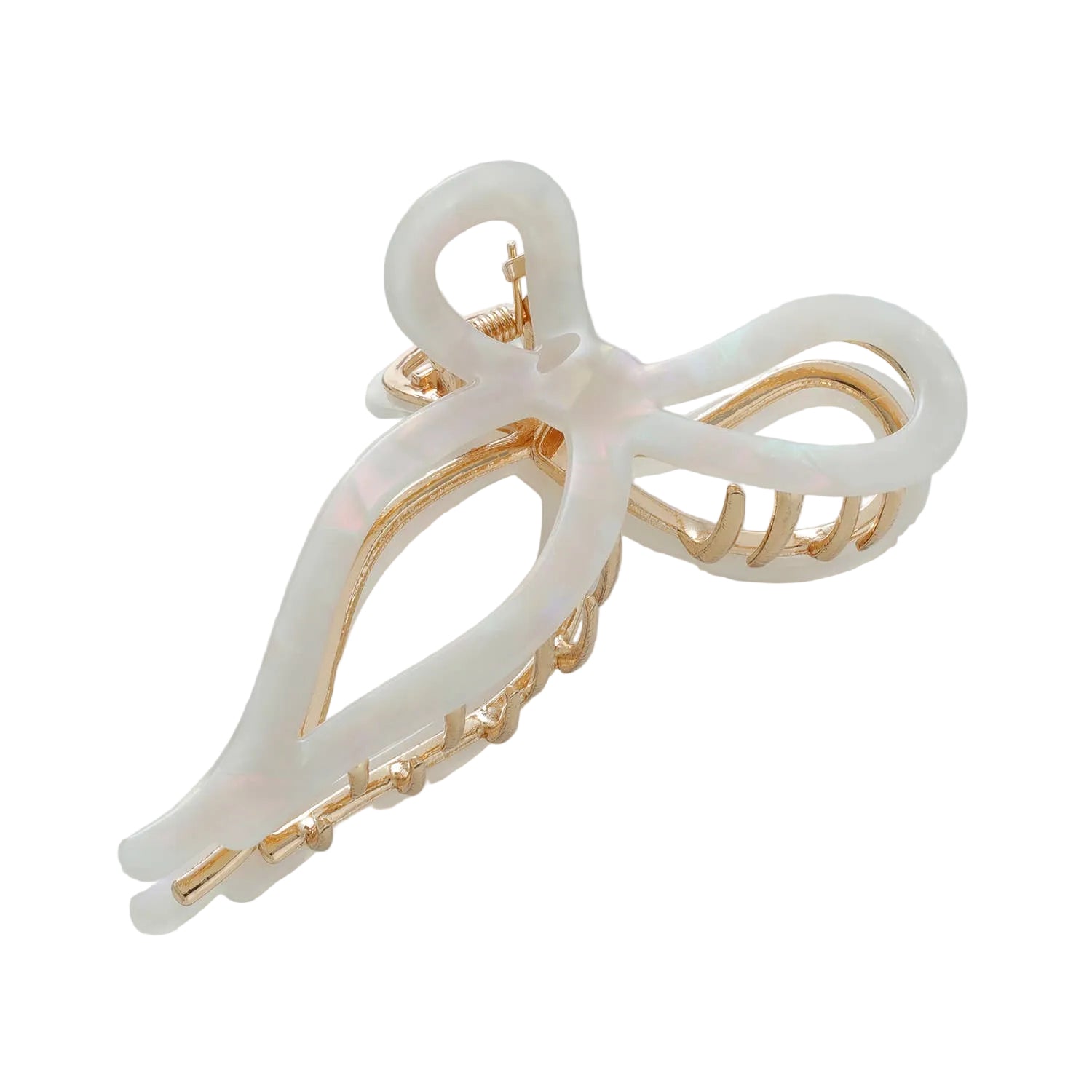 White hair clip with gold accents on a light gray background