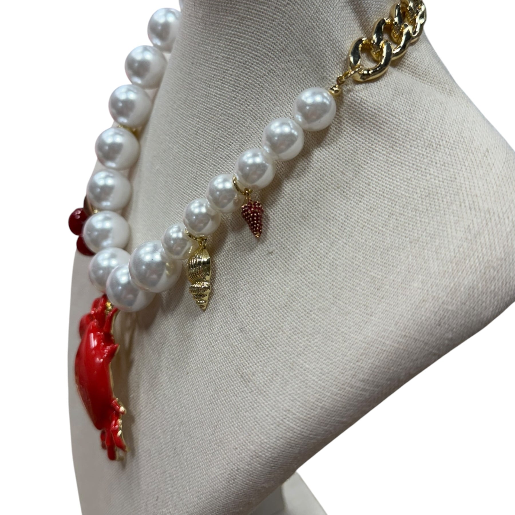 pearl and chain necklace with crab, cherry, strawberry, coin and shell