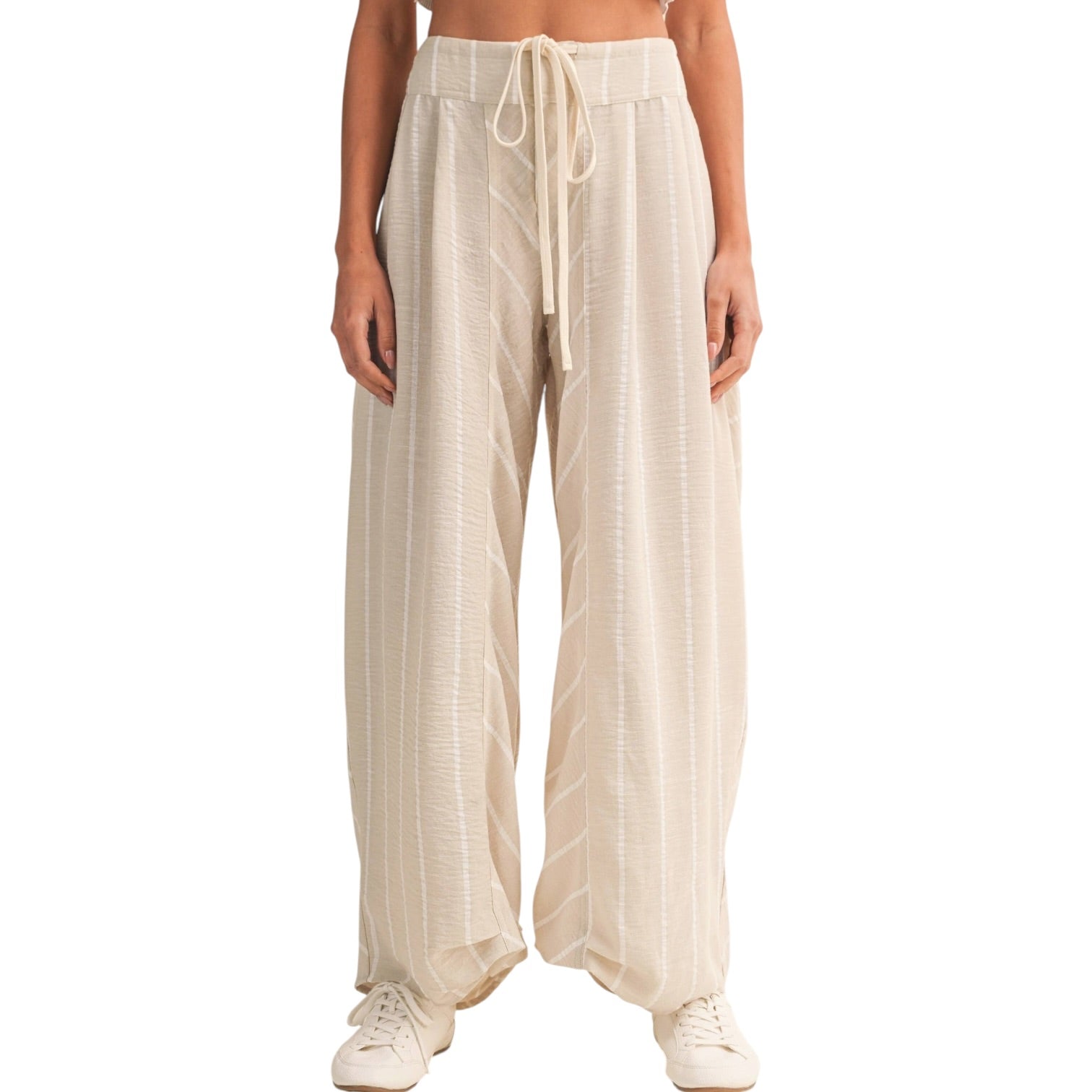 Beige wide-leg pants with a drawstring waist on a white background