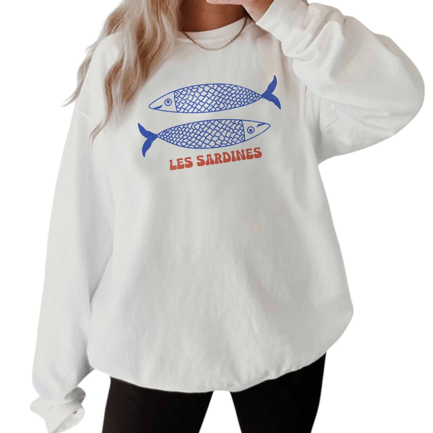White sweatshirt with blue fish graphics and 'LES SARDINES' text on a white background